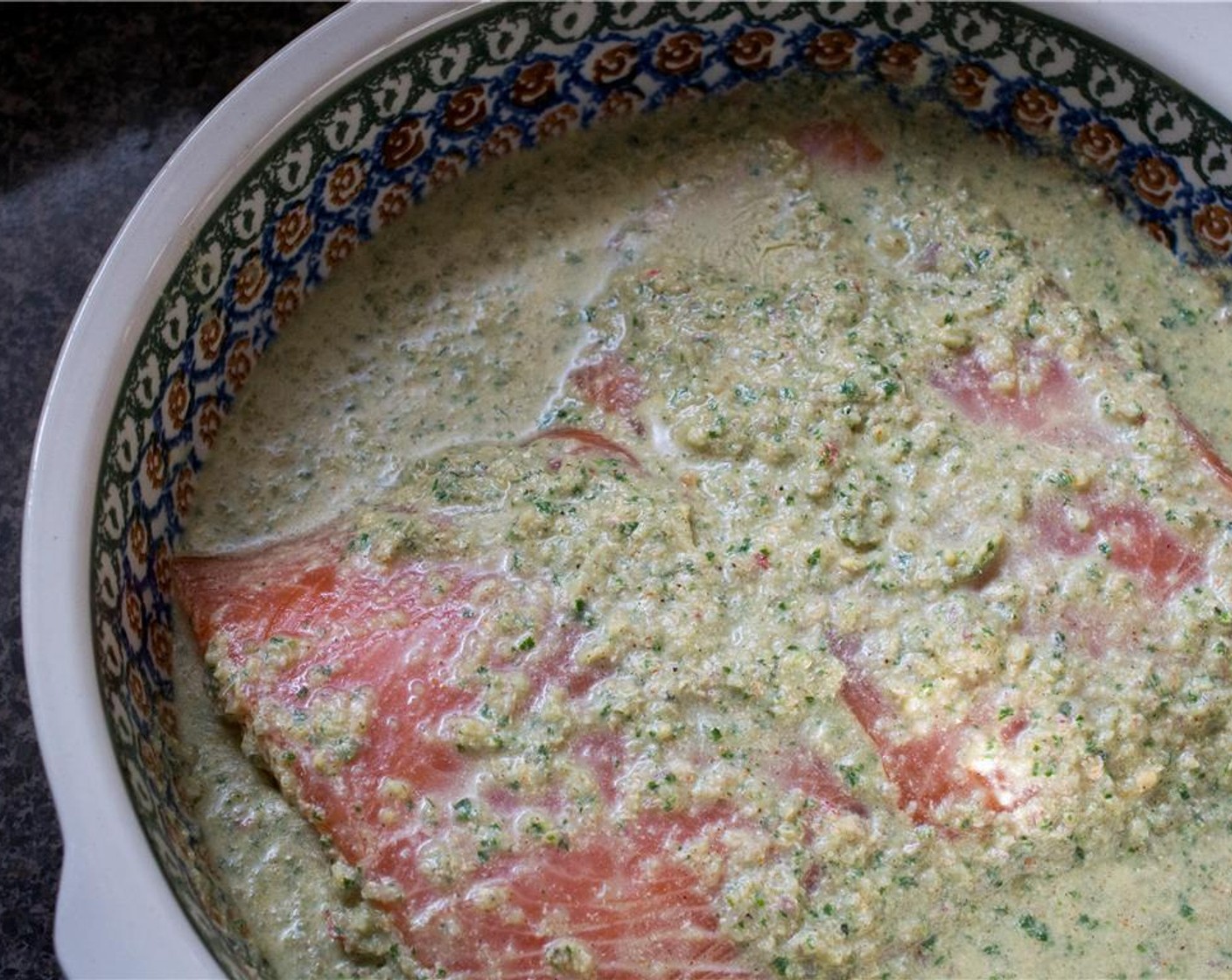 step 4 Place the Salmon Fillets (2) in a large bowl and cover both sides with half of the marinade. Reserve the other half of the marinade for later.  Allow to marinate for 10 minutes.