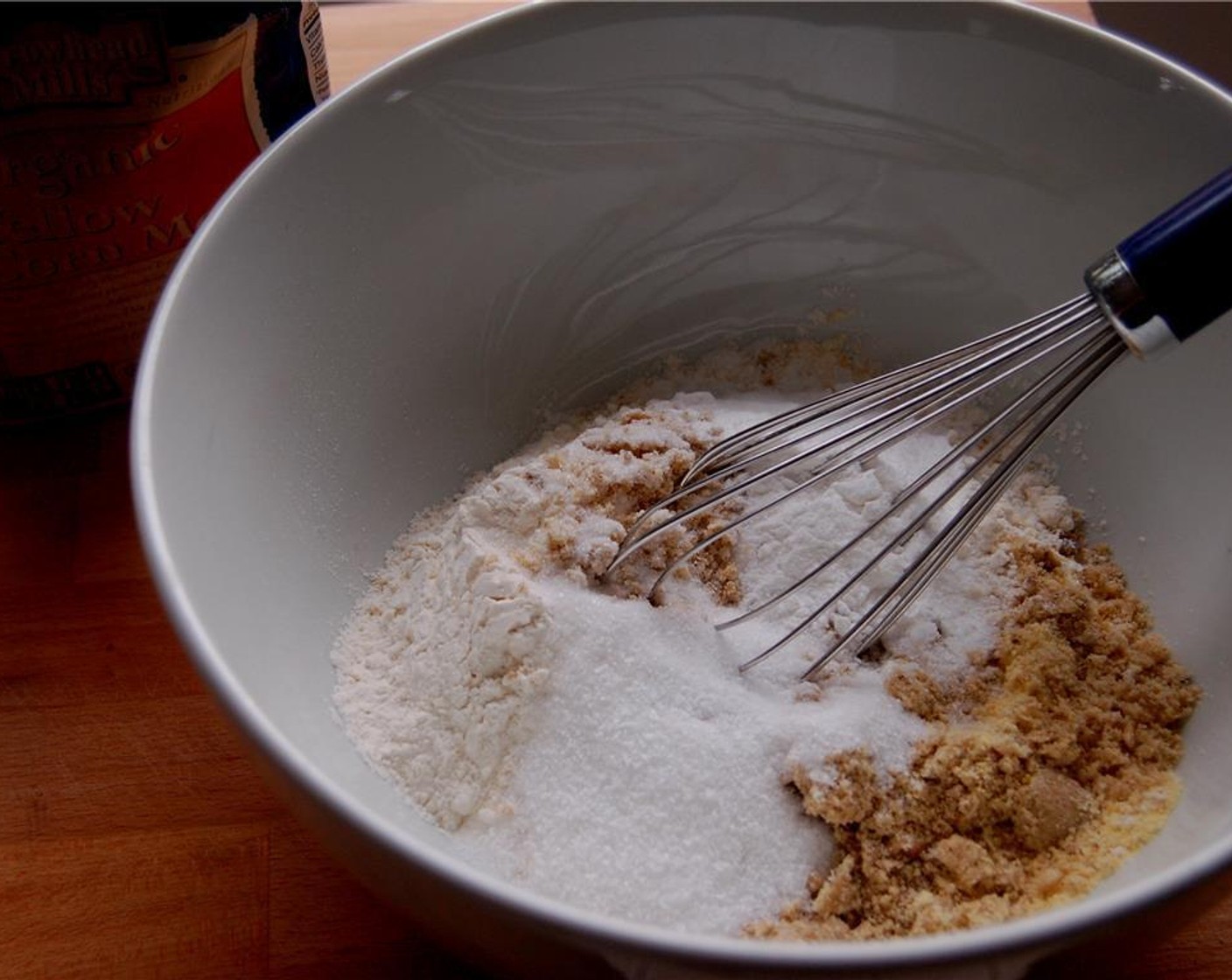 step 1 Combine All-Purpose Flour (1 3/4 cups), Cornmeal (3 Tbsp), Baking Powder (1 1/2 Tbsp), Walnut (1/4 cup), Granulated Sugar (1 1/2 Tbsp), and Kosher Salt (3/4 tsp) in a large bowl. Stir together.