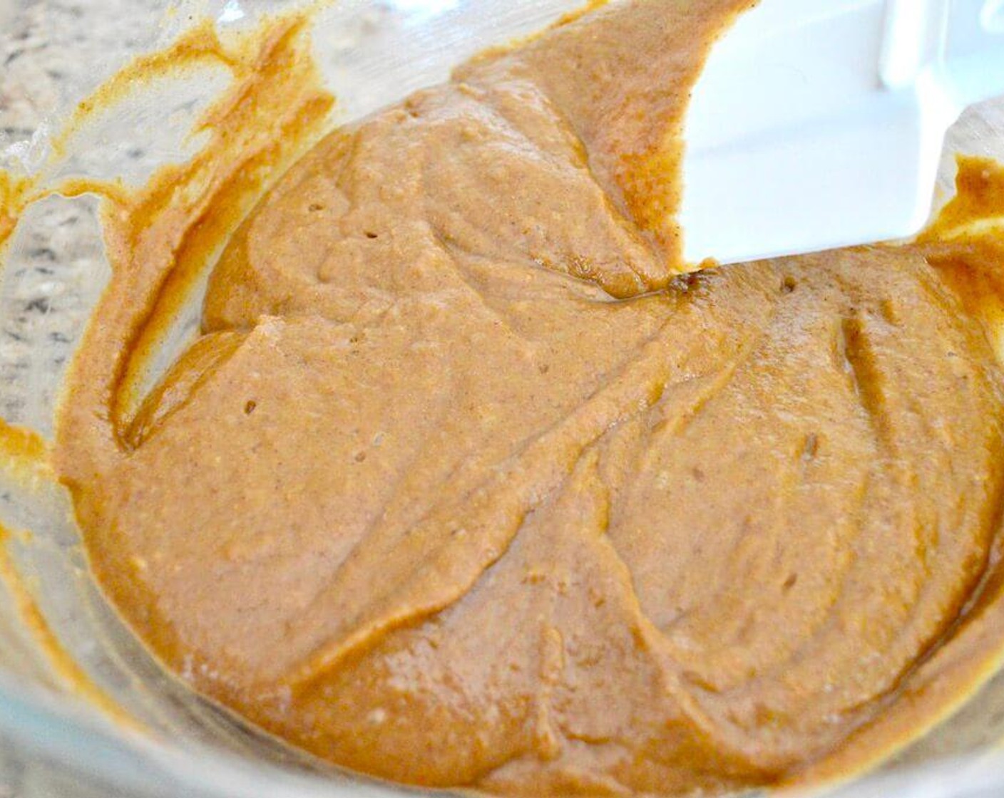step 3 In another large mixing bowl, whisk the Dark Brown Sugar (1 cup), Canned Pumpkin Purée (2/3 cup), Pumpkin Spice Extract (1 tsp), and Eggland's Best Classic Eggs (3) together for a minute or so to really get some air into it. Then use a spatula to gently fold in the dry ingredients just until they disappear in.