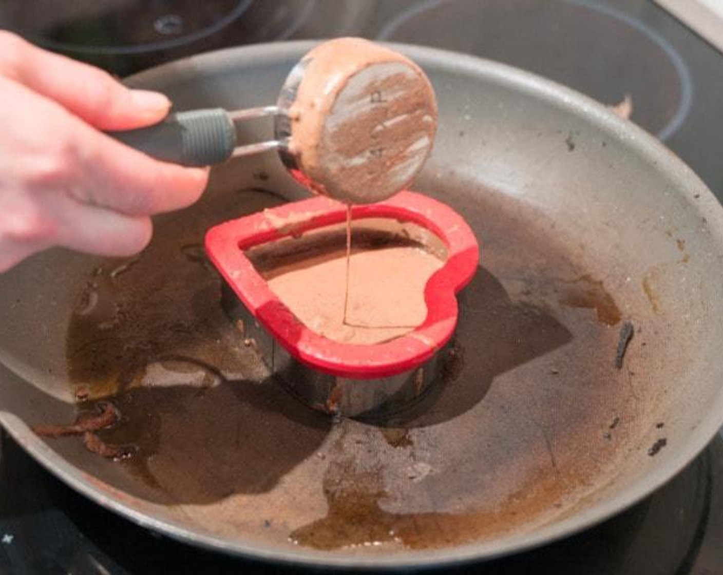 step 3 Melt Coconut Oil (as needed) on a large skillet or pan over medium/high heat. Place mold onto the pan and pour 1/4 cup batter into a mold or less if your mold is smaller. Flip immediately once bubbles form.