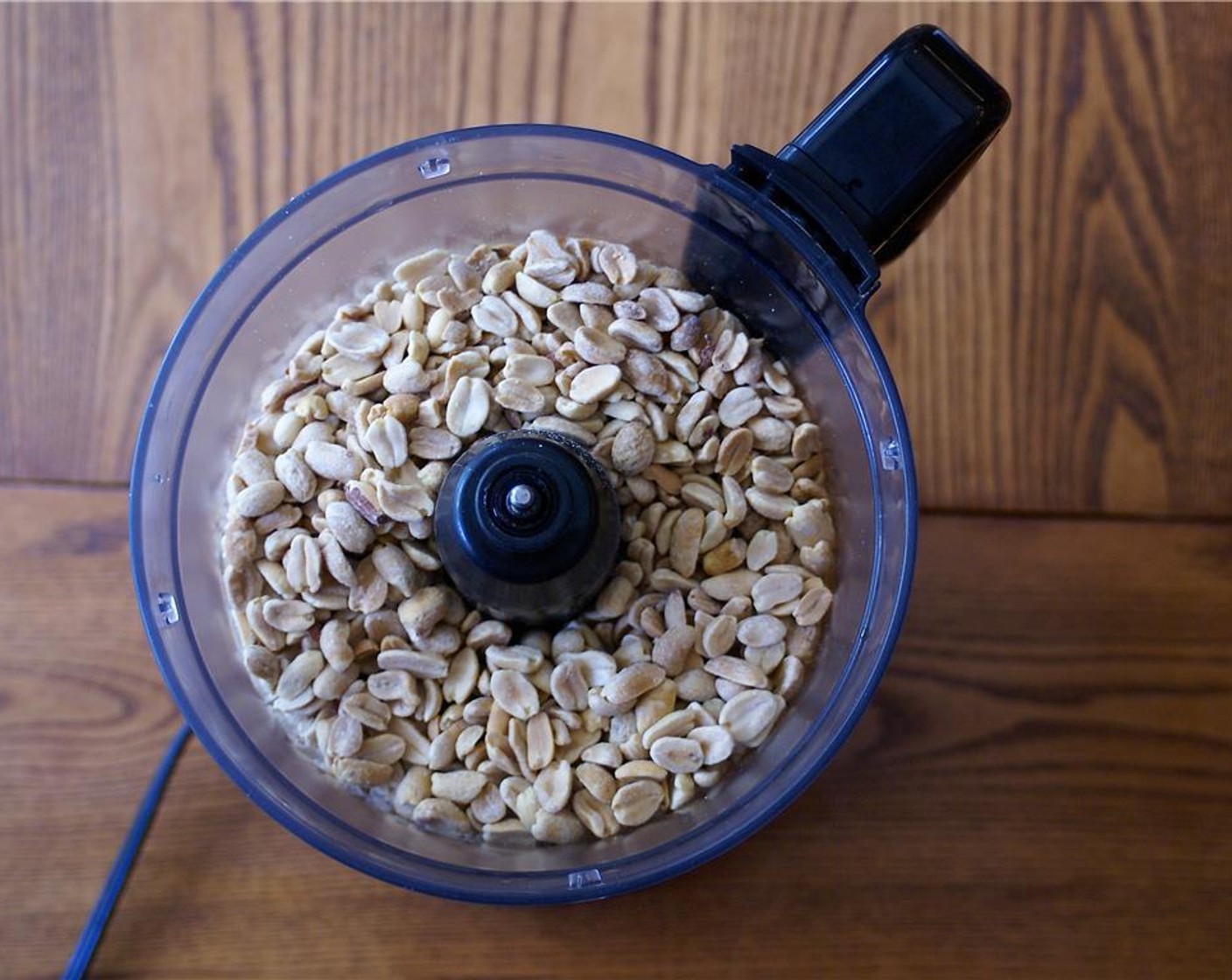 step 2 Add your peanuts to your food processor.