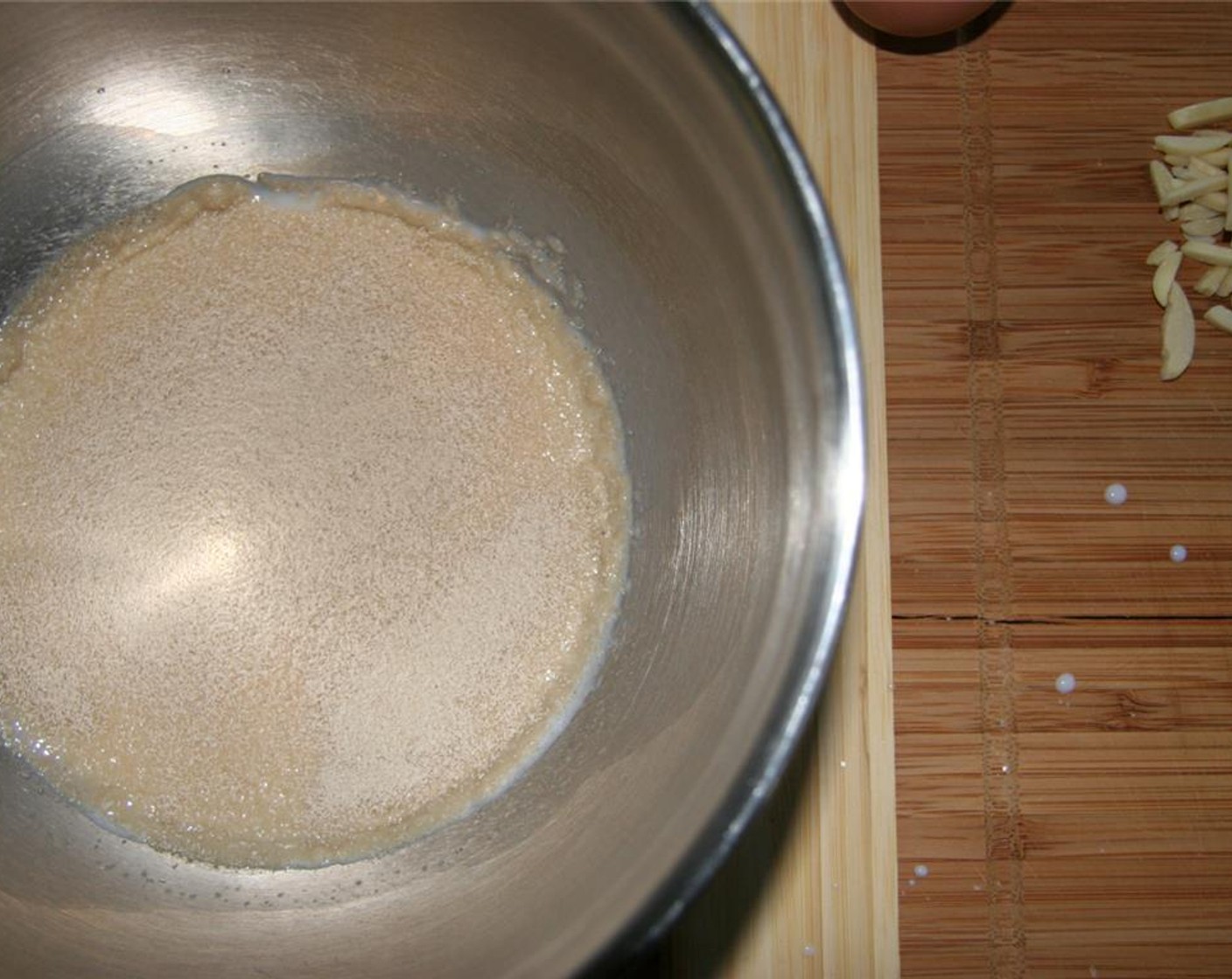 step 1 Combine Milk (2/3 cup), 1 tablespoon of the Granulated Sugar (4 Tbsp) and Active Dry Yeast (2 tsp) in a small bowl. Allow to proof until bubbly, about 5 minutes.