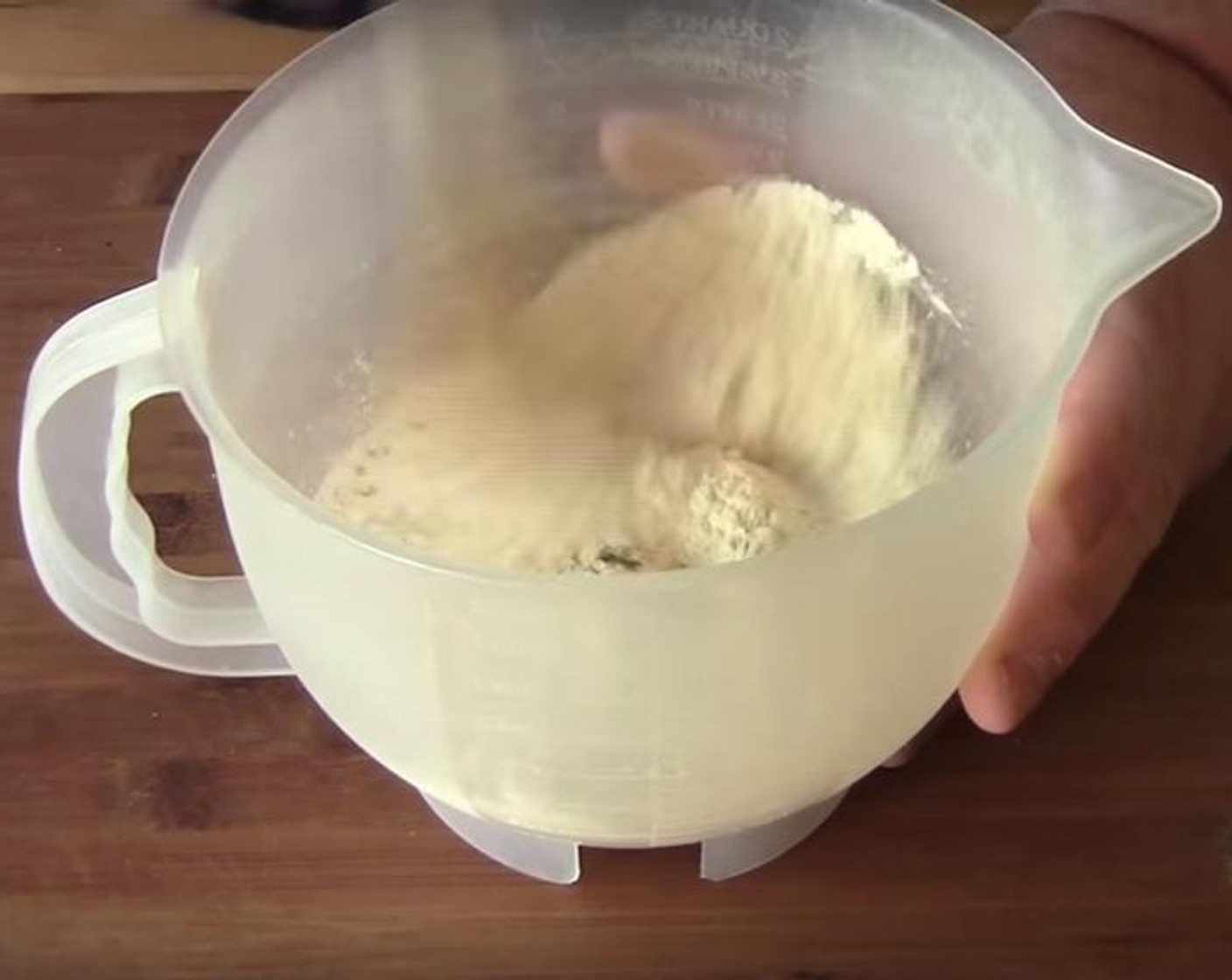 step 3 In a jug, add in All-Purpose Flour (3/4 cup), Salt (to taste), Ground Black Pepper (to taste), and Fresh Parsley (1 tsp). Stir them together.