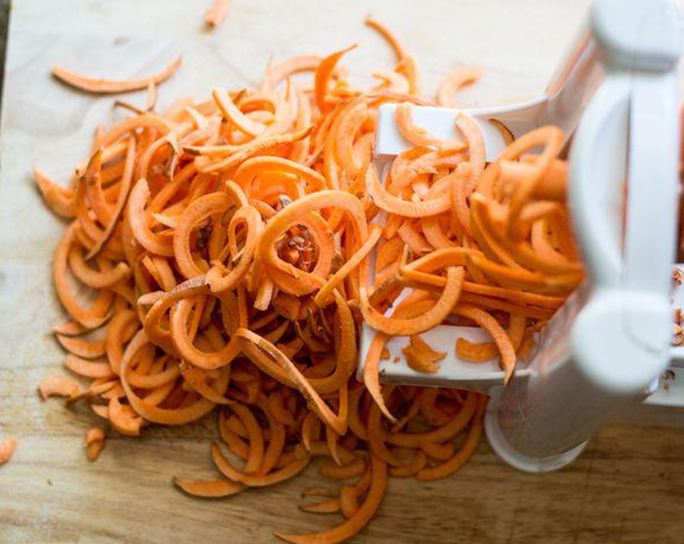 step 5 In an 8x10 or 9x9 baking dish, add a layer of spiralized Sweet Potatoes (2), followed by a layer of roasted veggie mix, Colby Jack Cheese (3/4 cup).