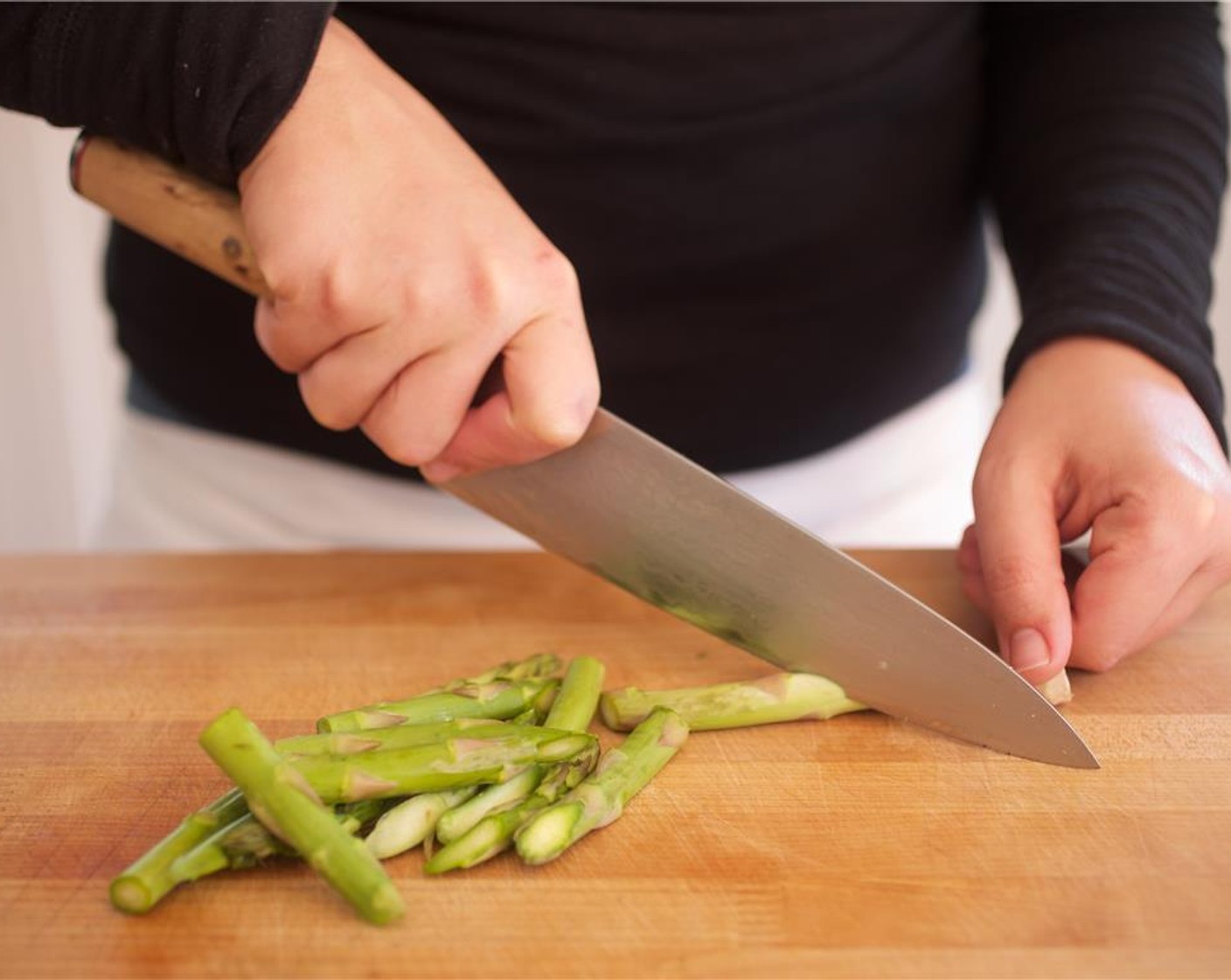 step 6 Trim Asparagus (1 2/3 cups) by snapping the thicker bottom ends where they break naturally. Cut into two inch pieces diagonally, and set aside. Cut Scallion (1 bunch) into one inch pieces and set aside.