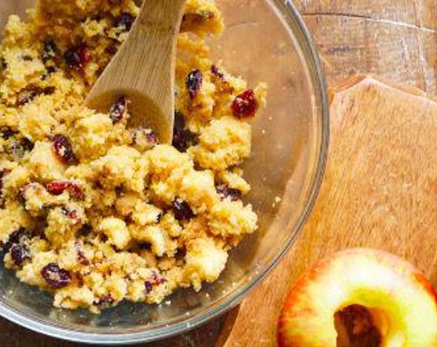 step 3 In a medium bowl, crumble the Corn Muffin (1) and mix with the Brown Sugar (2 Tbsp), Ground Cinnamon (1/2 tsp) Salt (1 pinch), and Dried Cranberries (1/4 cup).