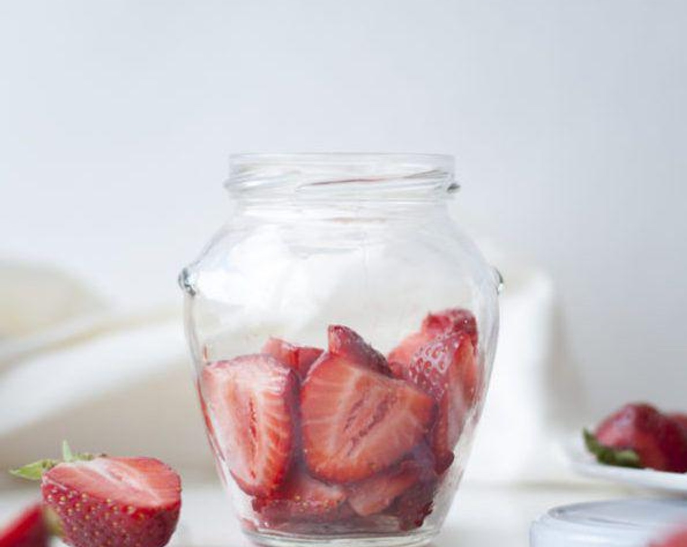 step 6 Chop Fresh Strawberries (1 1/3 cups) and place in the bottom of the jar.