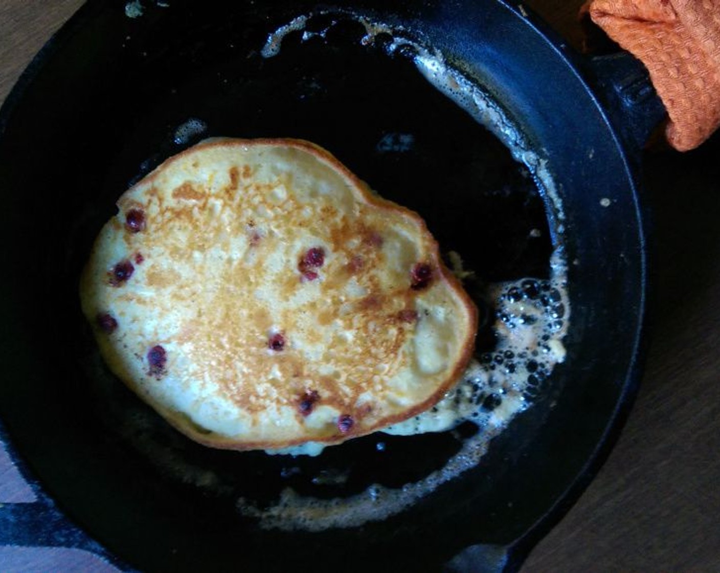 step 6 Pour about a half cup of batter into a cast iron skillet set over medium heat. Cook both sides until lightly browned.