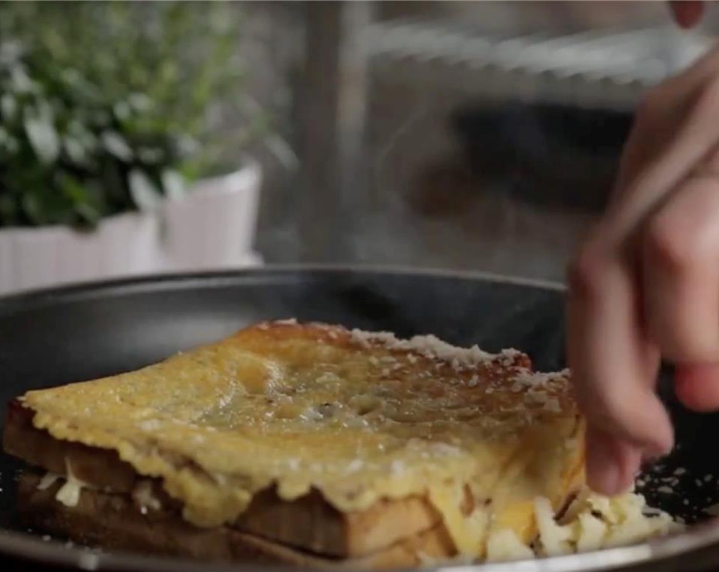 step 11 Sprinkle 1 tablespoon of Grated Parmesan Cheese (2 Tbsp) and 1 tablespoon of grated Emmental Cheese (2 Tbsp) around the crust of each sandwich.