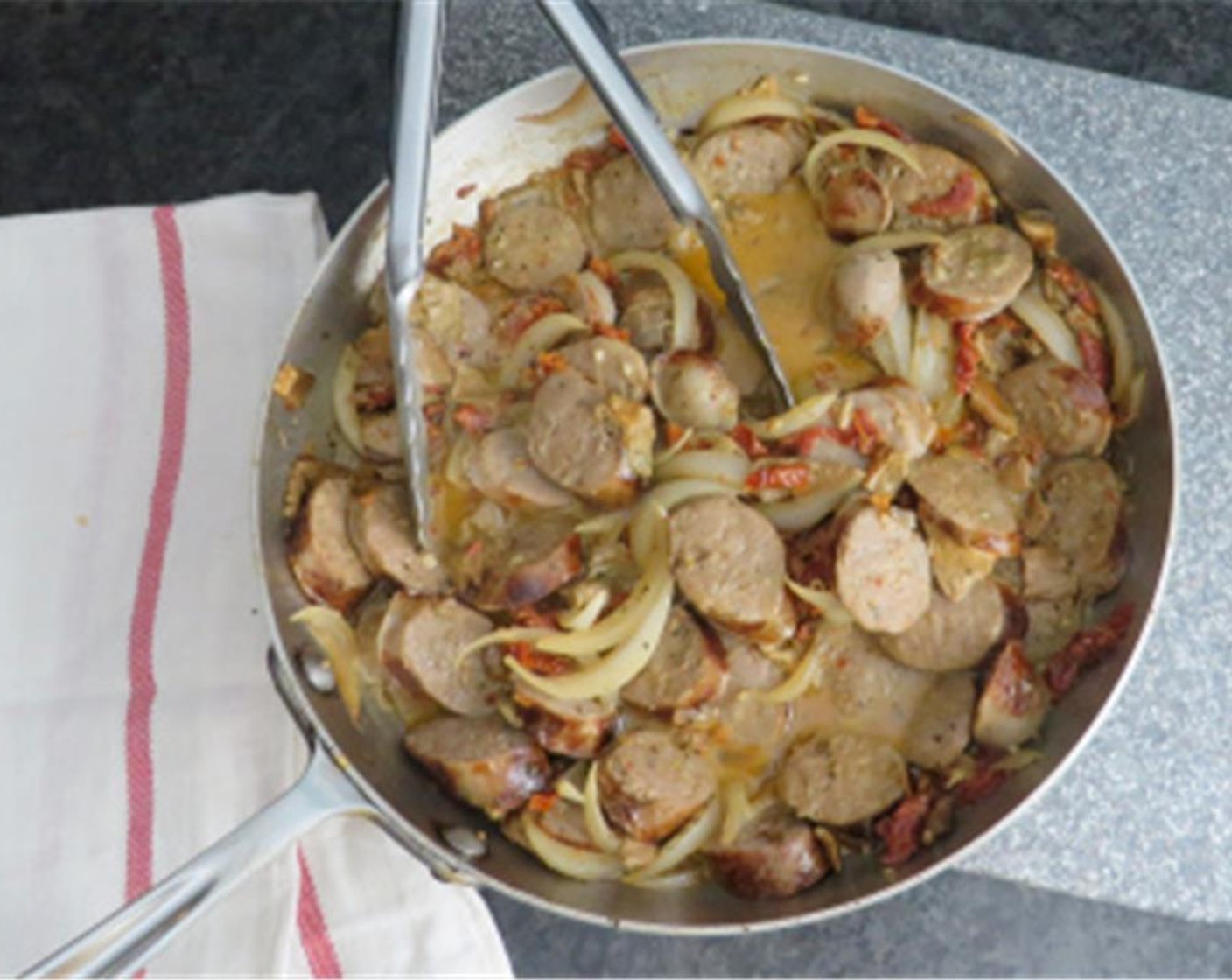 step 9 Add Italian sausage back into the pan. Add drained cavatappi and broccoli florets, and toss together. Add parmesan cheese and toss to combine. Serve with additional Parmesan cheese if desired. Enjoy!