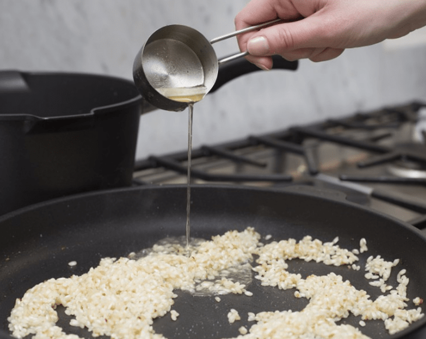 step 12 Add Vegetable Broth (1/4 cup) and cook while stirring vigorously until liquid is almost fully absorbed. Repeat until you’ve used all the broth and the rice is tender but still firm - “al dente”.