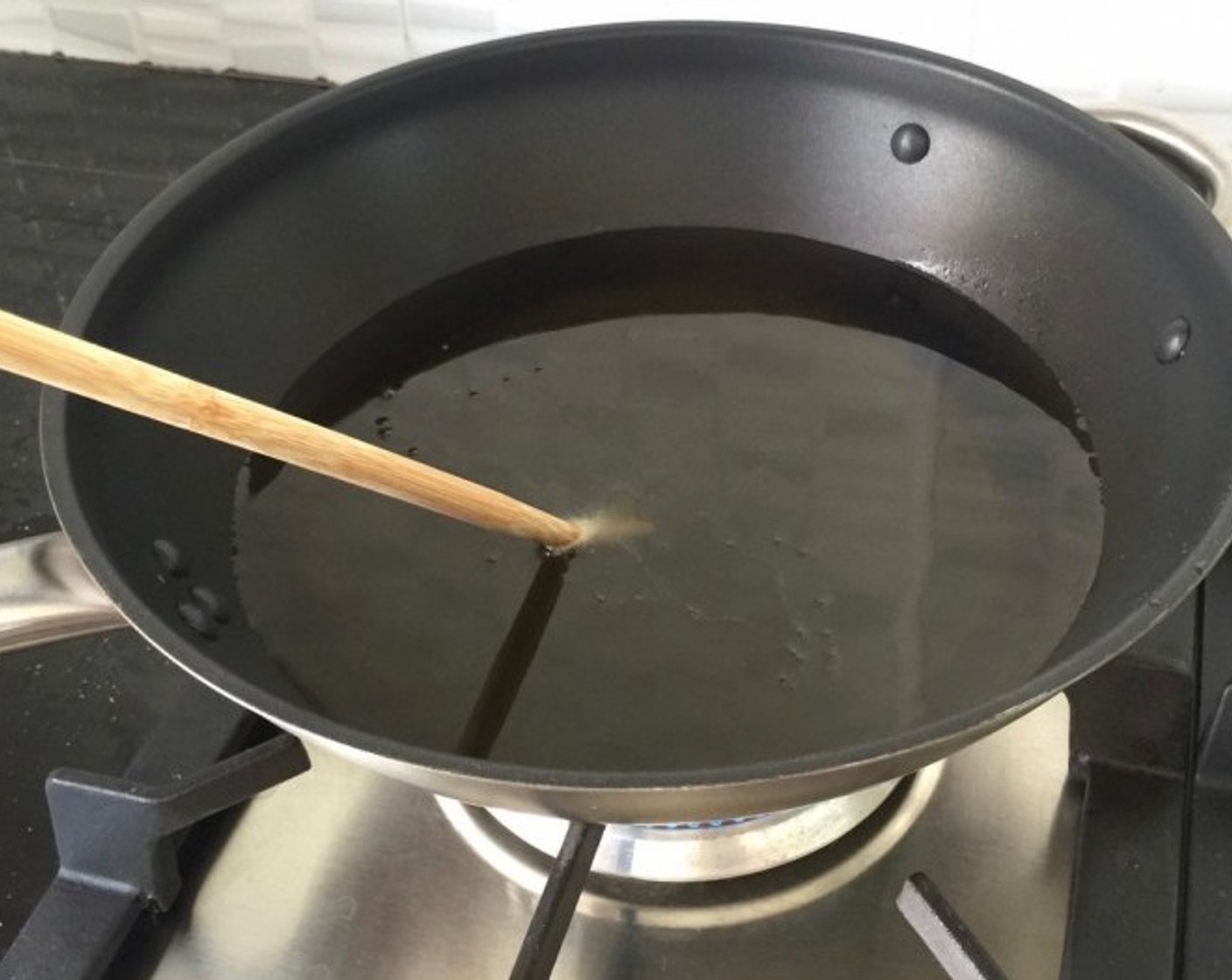 step 15 In a large pot or pan, fill with about 2 inches of Vegetable Oil (as needed). Heat until hot and bubbles appear at the tip when a wooden chopstick is dipped into the oil.