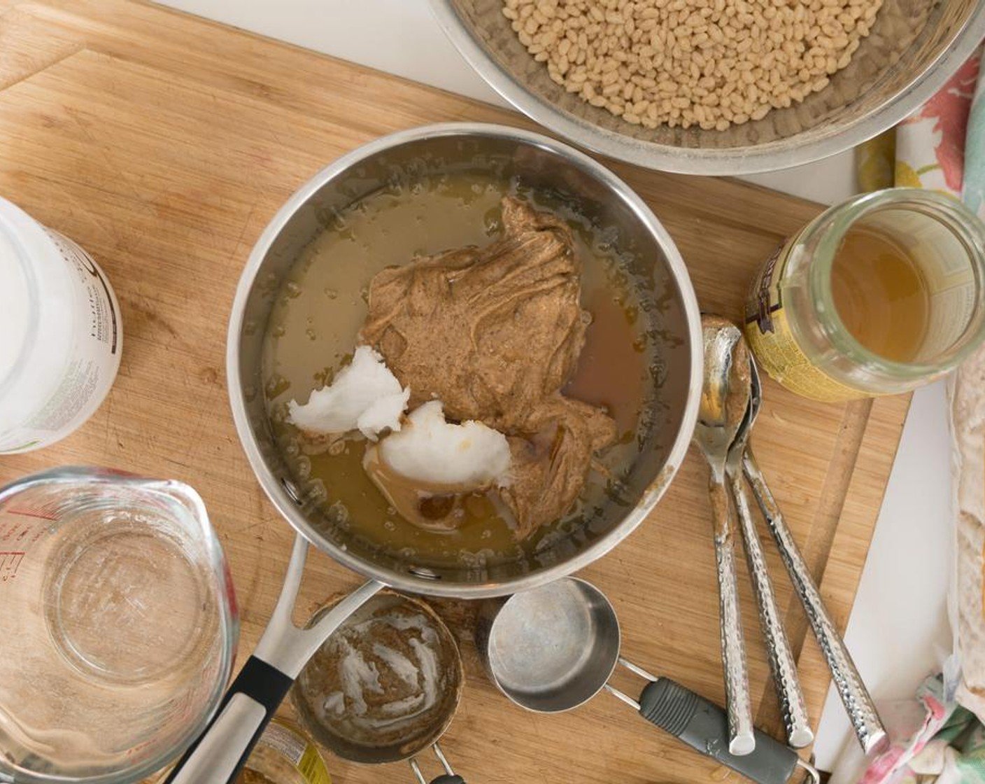 step 3 In a pot on low heat, combine Brown Rice Syrup (1/2 cup), Almond Butter (1/2 cup), Coconut Oil (2 Tbsp) and Dark Pure Maple Syrup (1 Tbsp). Once combined, remove from heat.