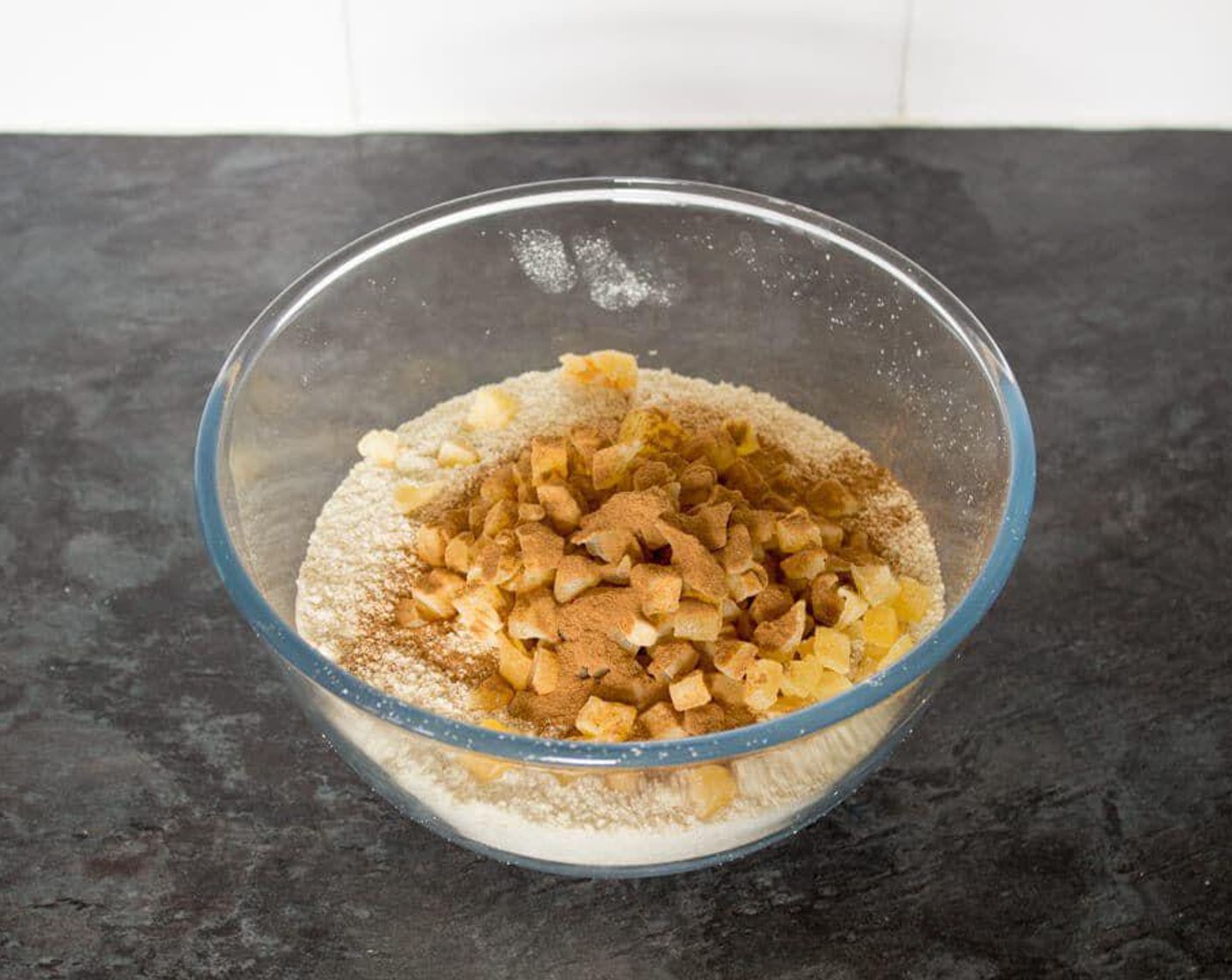 step 3 Tip into a large bowl and mix with the remaining Quick Cooking Oats (1 1/2 cups). Mix in the Ground Cinnamon (1/2 Tbsp), Dried Apples (1 1/4 cups), and Salt (1/4 tsp), and then set to one side.
