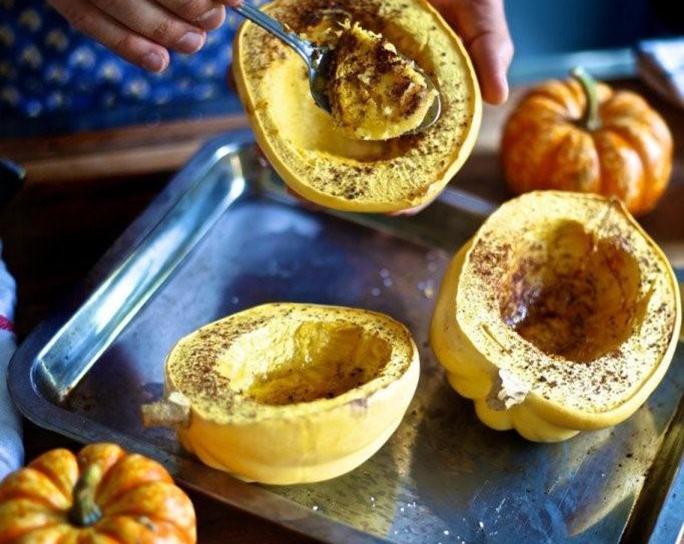 step 5 When the squash is fork tender, remove from the oven and let cool at room temperature for 10-15 minutes. Once cooled, and able to be handled, scoop out all of the inner flesh with a large spoon or melon baller and give it a rough chop. Discard the skin and set the flesh aside for the moment.