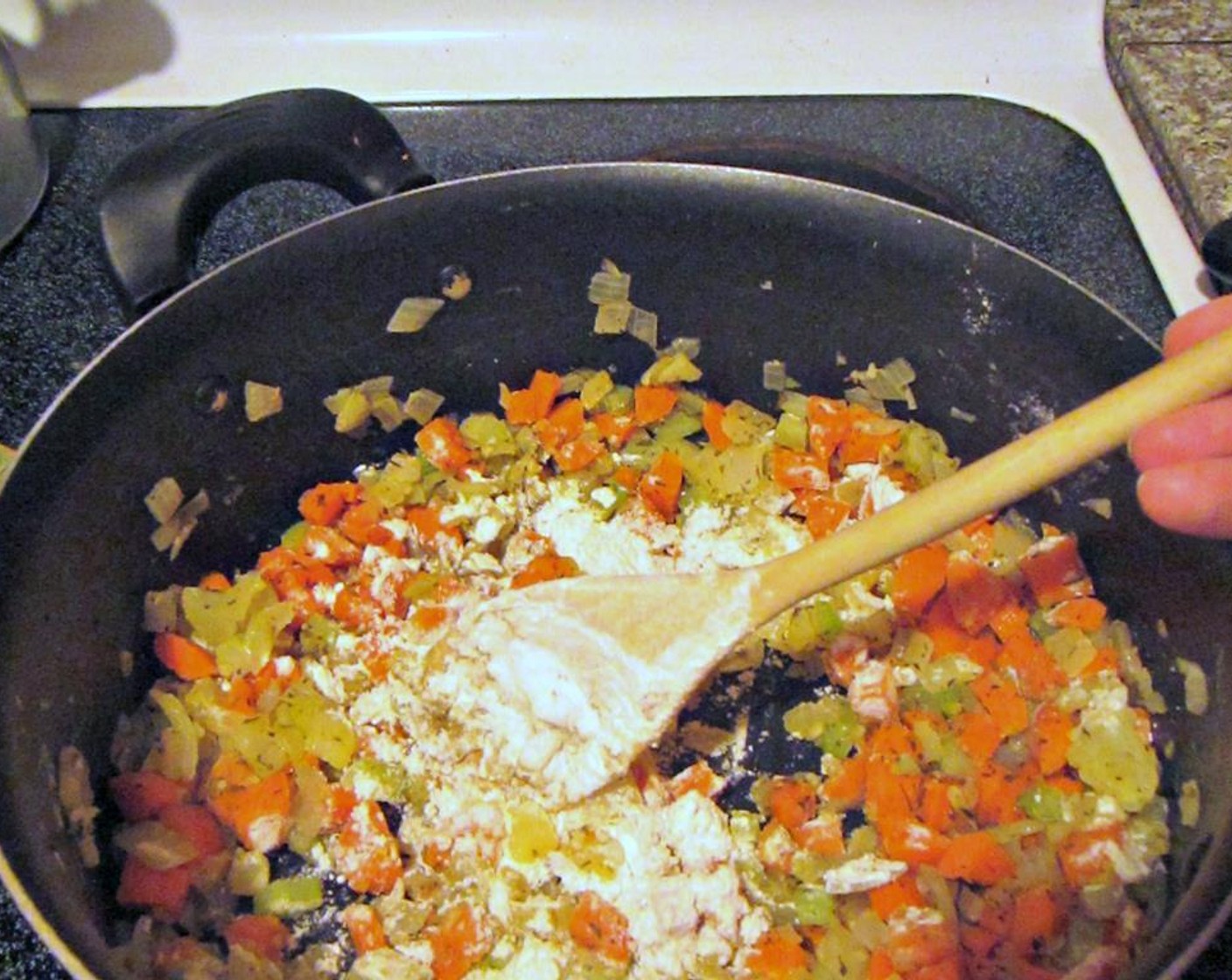 step 2 Once the diced Carrot are cooperating, stir in the All-Purpose Flour (1 cup) and Dry Mustard (1 tsp) to the vegetable mix. Make sure the flour coats all the vegetables and that your mixture starts to thicken and clump together.