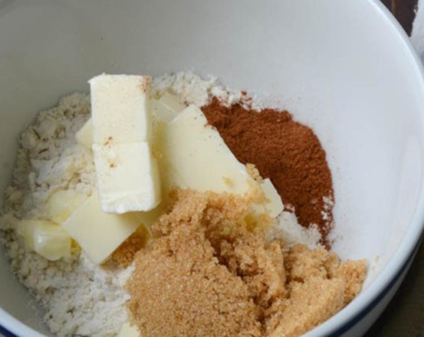 step 2 To make the streusel, in a small bowl combine the Unsalted Butter (2 1/2 Tbsp), All-Purpose Flour (1/4 cup), Brown Sugar (2 Tbsp) and Ground Cinnamon (1/2 tsp)