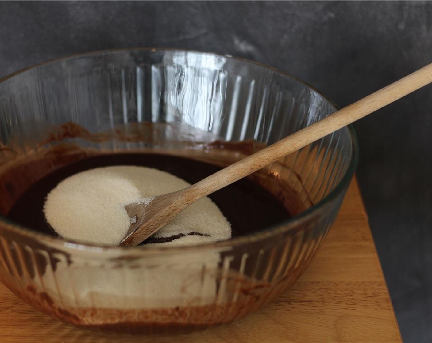 step 3 Stir in the Granulated Sugar (2 cups) until smooth, then stir in the Vanilla Extract (1 Tbsp).