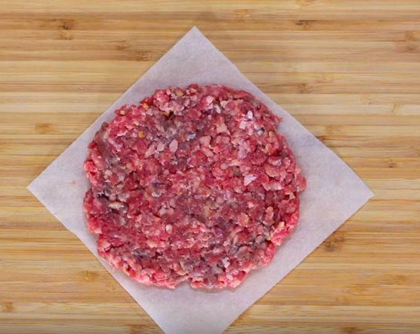 step 1 Shape Ground Beef (1.1 lb) into four patties slightly larger than the hamburger bun. Smooth out the edges.