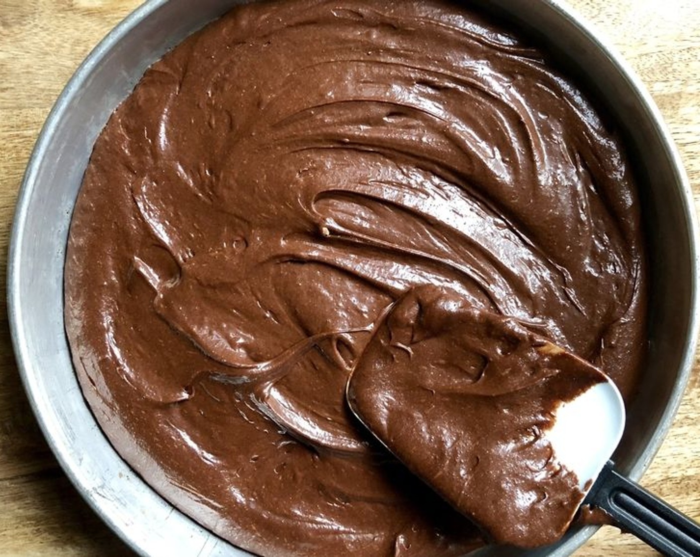 step 5 Pour the batter into the prepared cake pan. Bake for 25 minutes in the preheated oven.