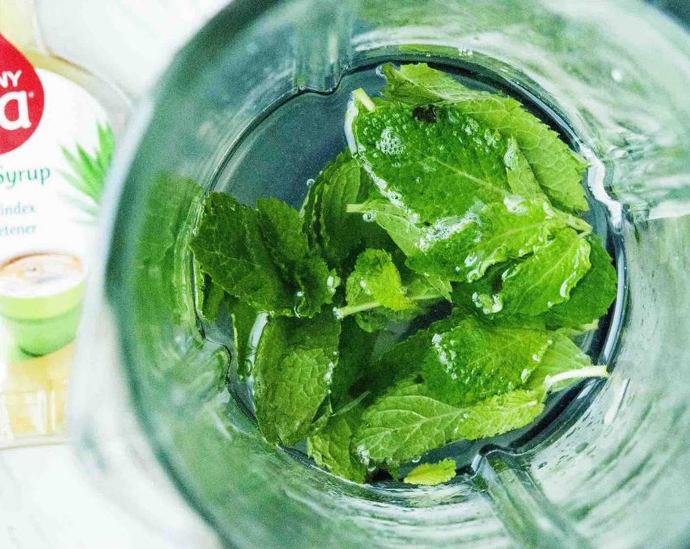 step 3 Place the mint leaves, Water (1 1/4 cups), lime juice, and Agave Syrup (1 tsp) into a blender and blend.