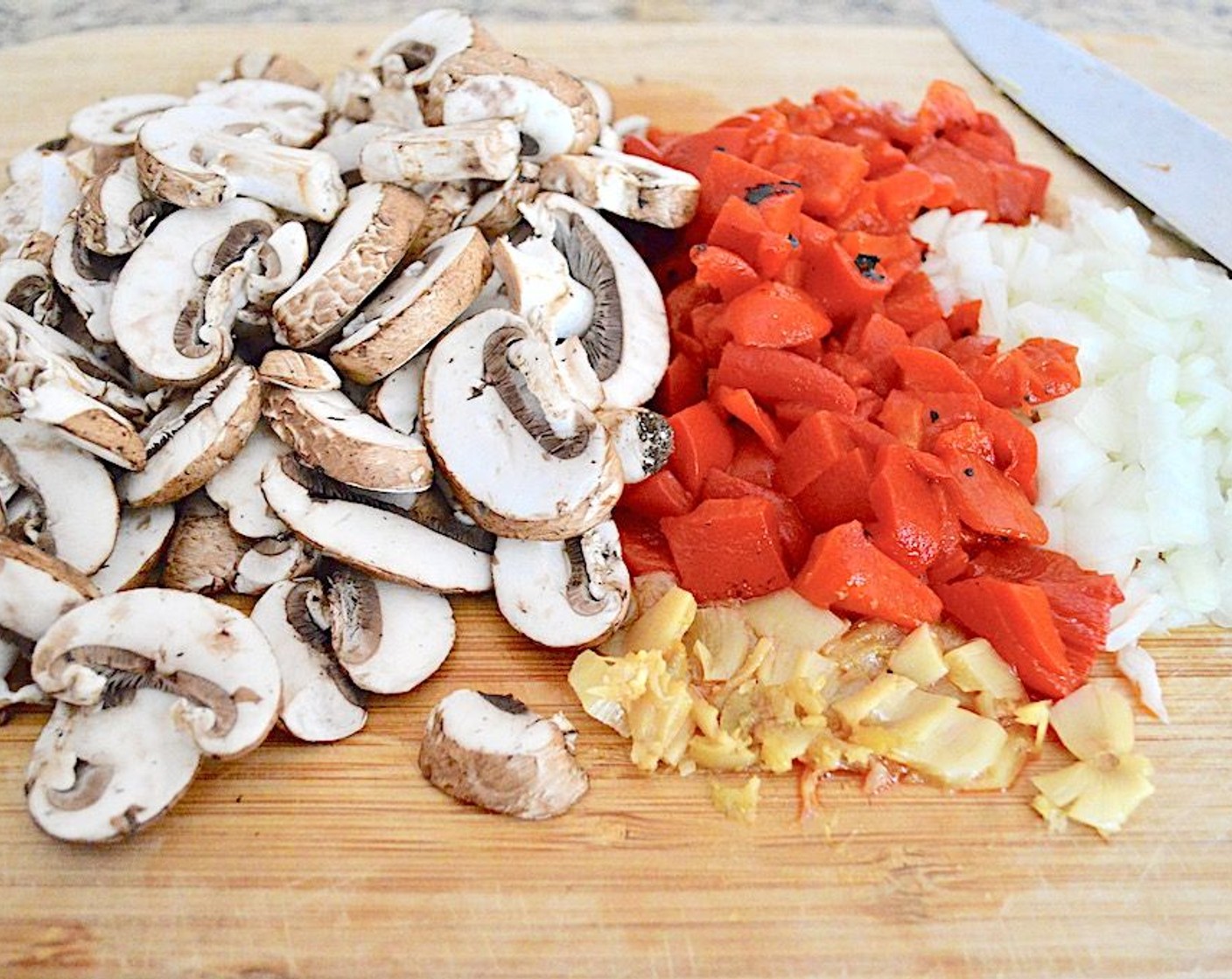 step 1 Into a large dutch oven or stock pot over medium-high heat, heat Olive Oil (1 dash). Add the Cremini Mushrooms (2 1/4 cups) and Jarred Roasted Red Peppers (1 jar), and let them soften for a couple of minutes.