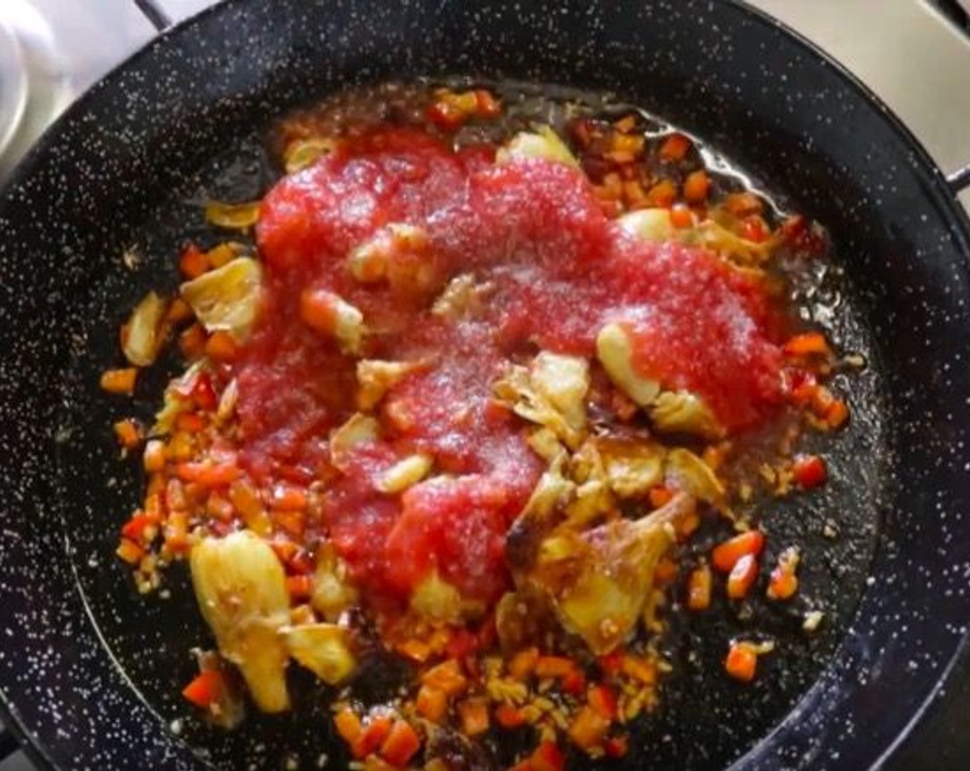 step 11 Add Canned Tomato Purée (1/2 cup) and season with additional sea salt and freshly cracked black pepper. Mix it all together until well combined. Cook for 1 minute.