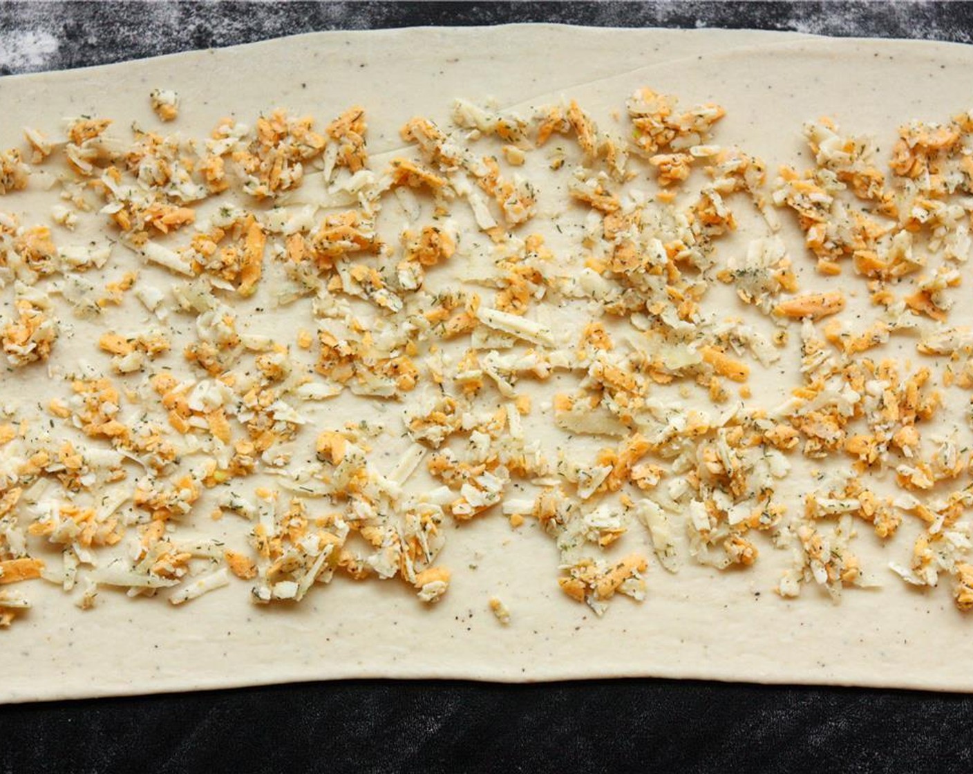 step 9 Spread filling evenly across the dough, leaving a half-inch border on all sides.