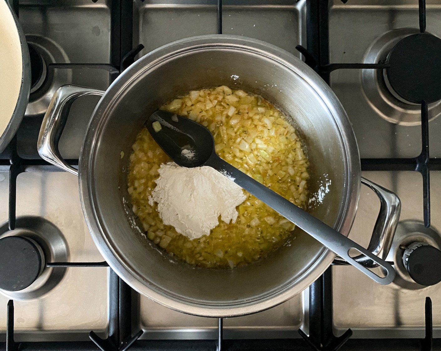 step 3 Sauté the onion in Salted Butter (1/4 cup) until softened and fragrant. Add the All-Purpose Flour (1/2 cup) and stir vigorously.