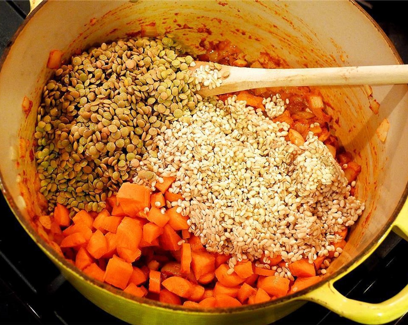 step 3 Add the Red Lentils (1/3 cup), Bulgur Wheat (1/2 cup), Carrot (1) and Vegetable Broth (2 1/2 cups). Turn the heat up so that the mixture is simmering.