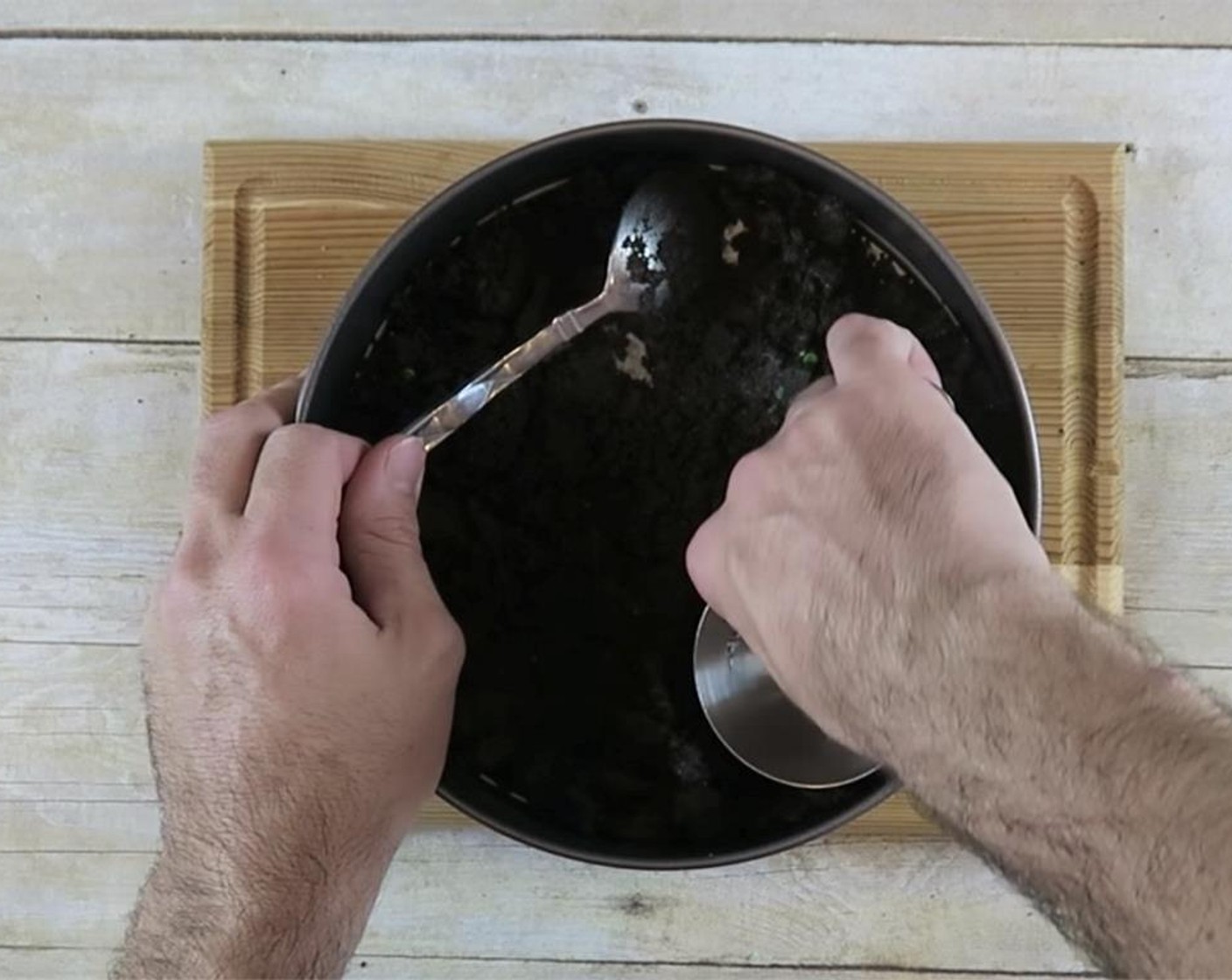 step 4 This will form the base and we will use this to line the pan. Pour mixture into springform pan. Push down with the back of a spoon or the bottom of a measuring cup to form the base. Make sure you push around the sides of the tin as well.