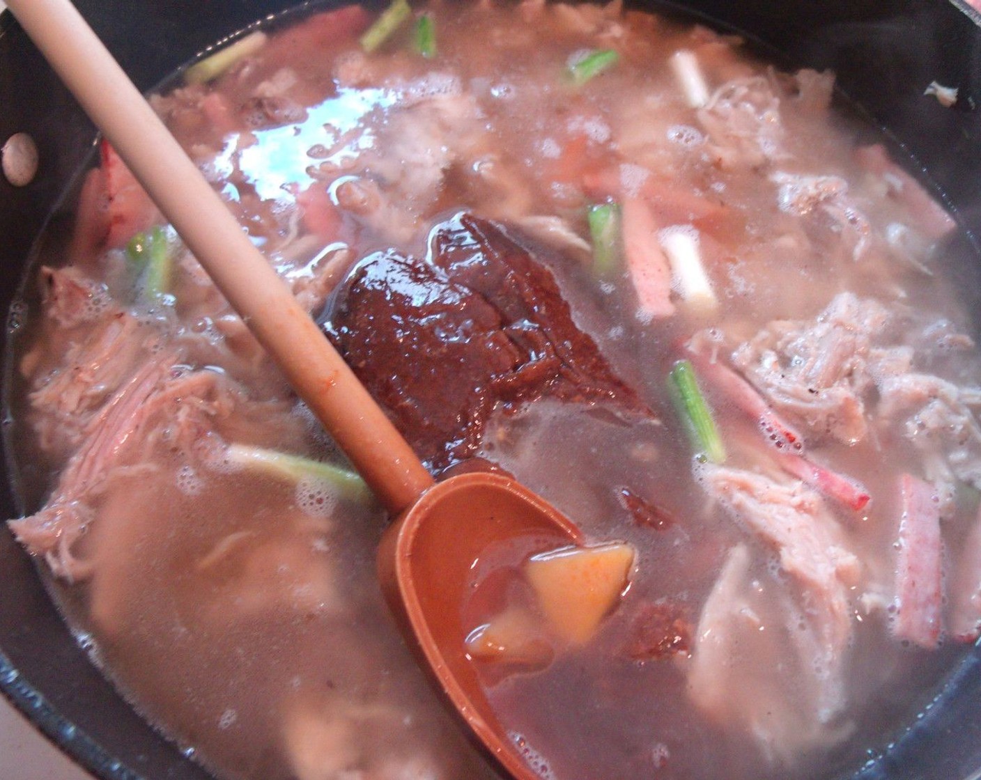 step 6 Add the Char Siu (6 oz), Chicken Stock (4 cups), Hoisin Sauce (1/4 cup) and Chili Paste (1 tsp). Bring to a simmer for 2 minutes.