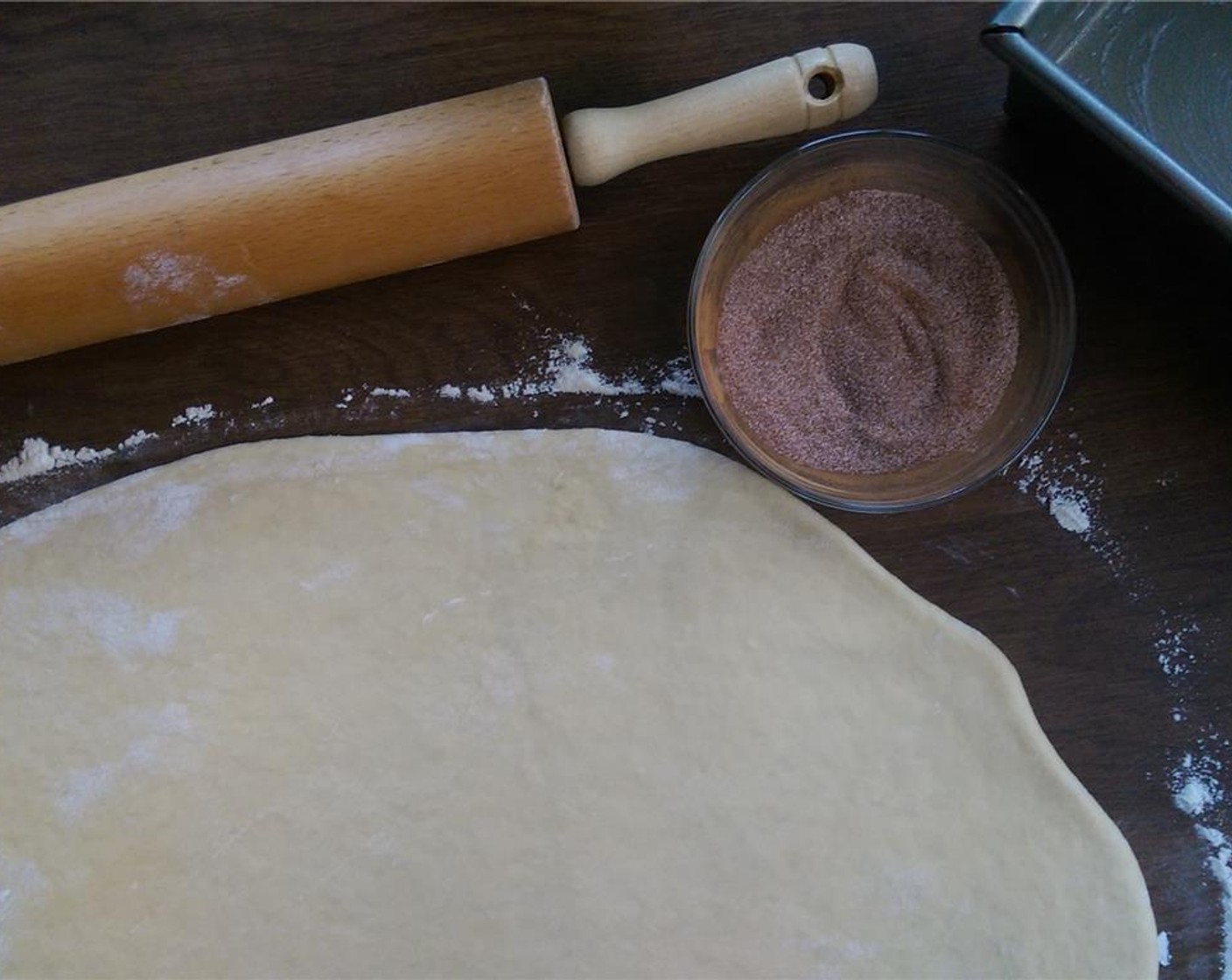 step 5 Punch dough down and roll into rectangle about 18″ x 8″.