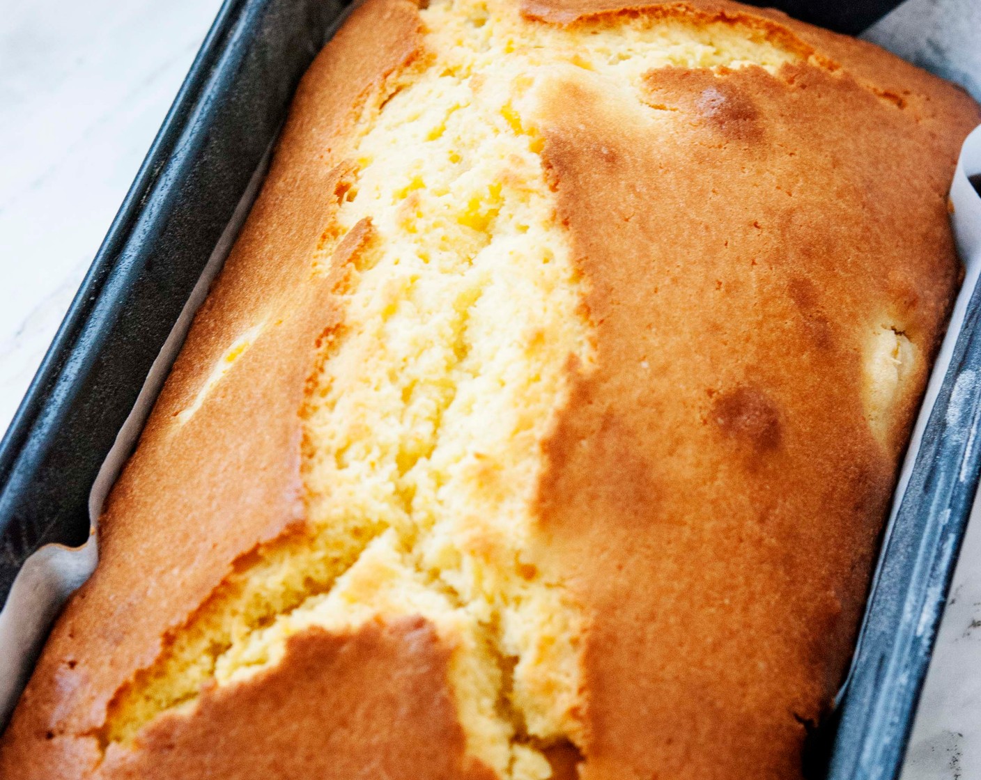 step 11 Remove bread from the oven and poke the top all over with a skewer.