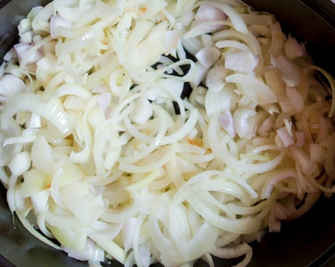 step 2 Lower the heat to medium and cover with a lid. Leave until the onions are soft and translucent, about 25 minutes. Stir occasionally.