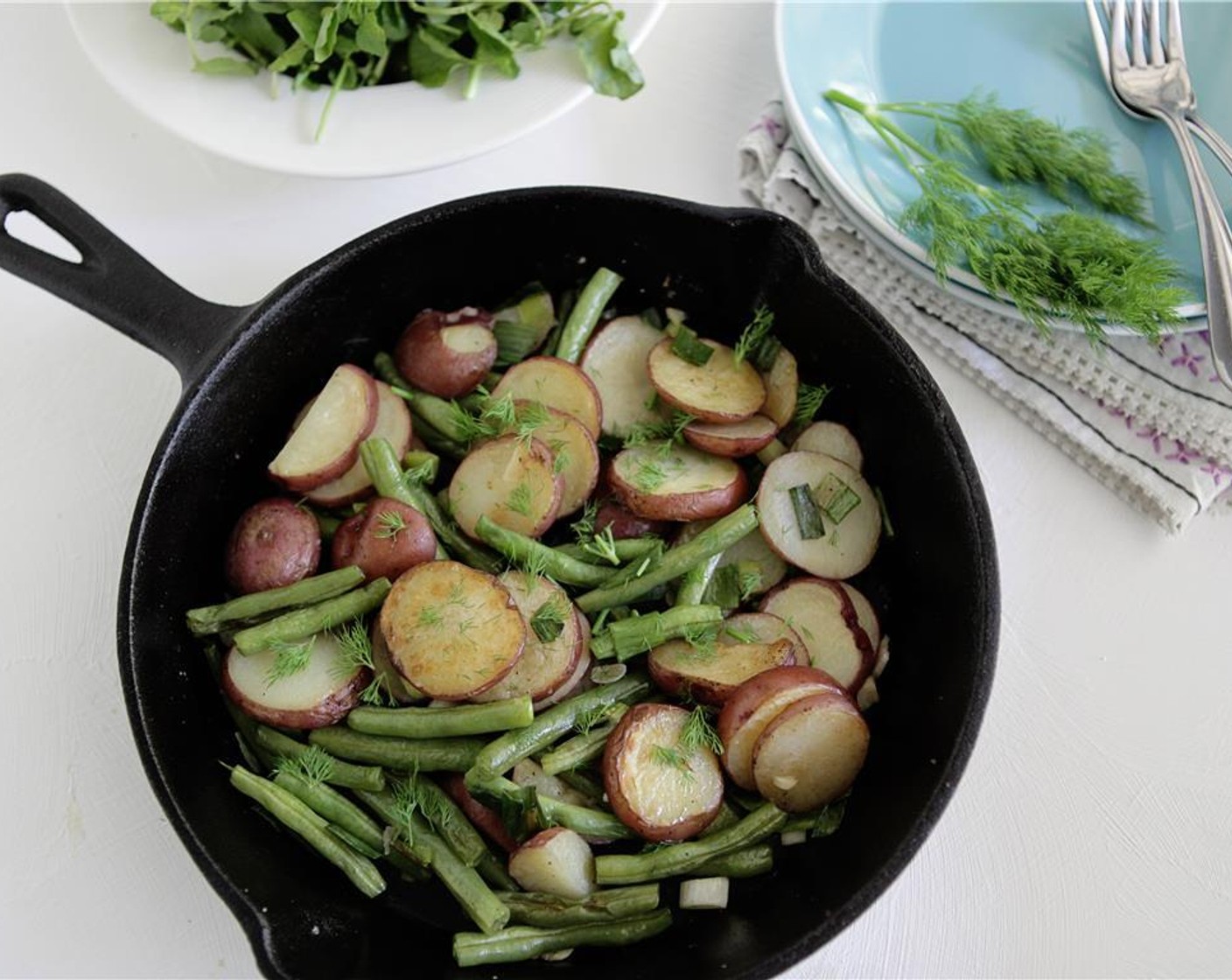 step 9 Remove from the oven, add Fresh Dill (1 tsp) and additional salt, if desired, and toss to combine. Cool slightly and serve warm in the skillet.