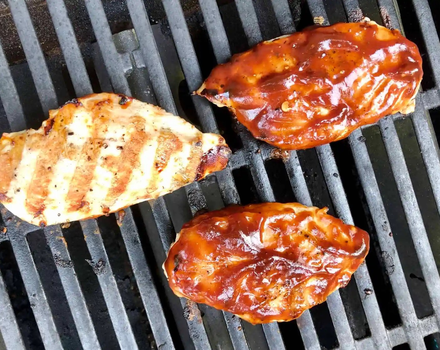 step 3 Using metal tongs, place the chicken breasts on preheated grill; meaty side down. Generously brush the exposed side of each breast with Barbecue Sauce (1/2 cup). Close the grill cover.