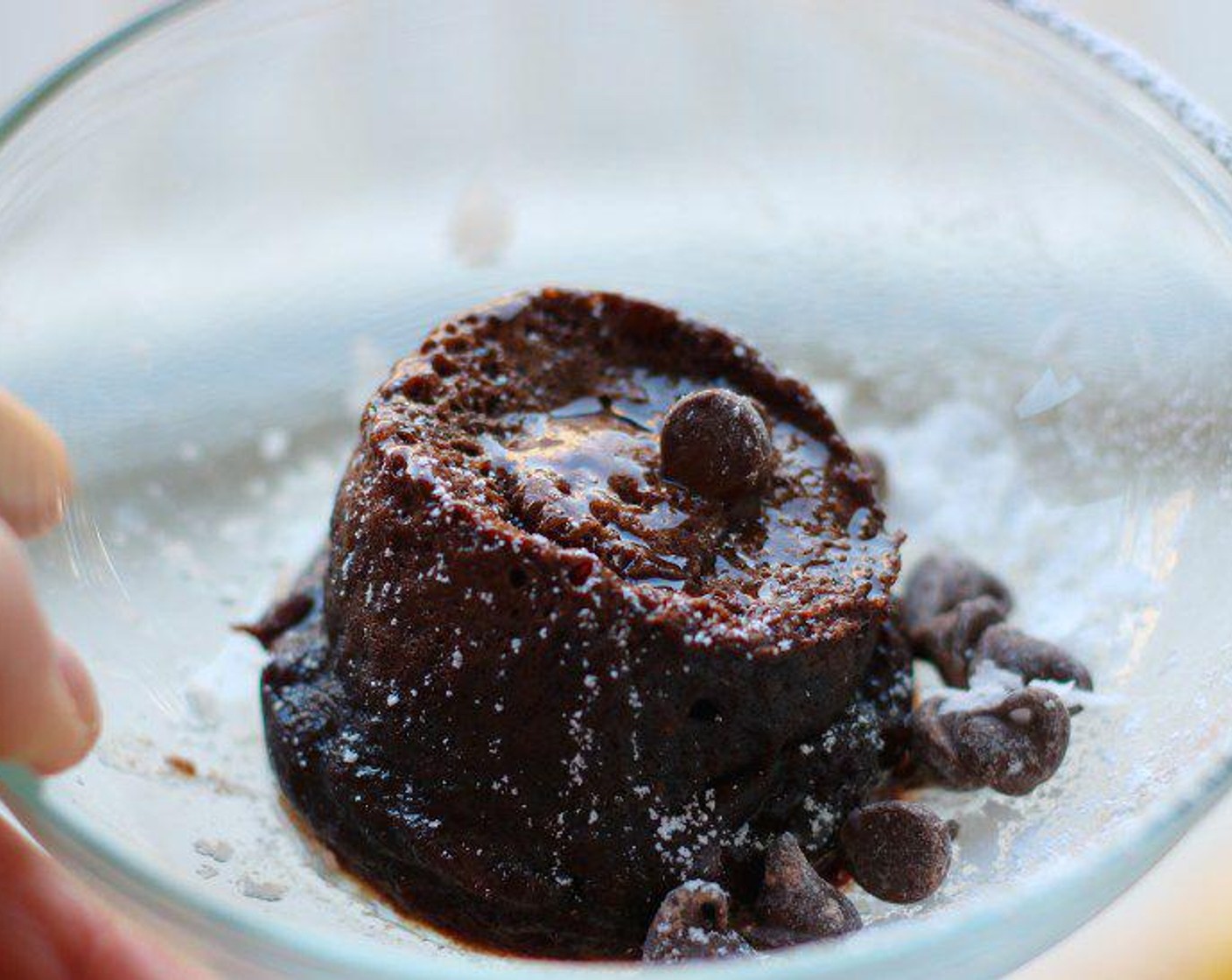 step 3 Remove from the mug and put in a small bowl, garnish with coconut flakes, chocolate chips, and a sprinkling of powdered sugar if preferred. Serve warm and enjoy!