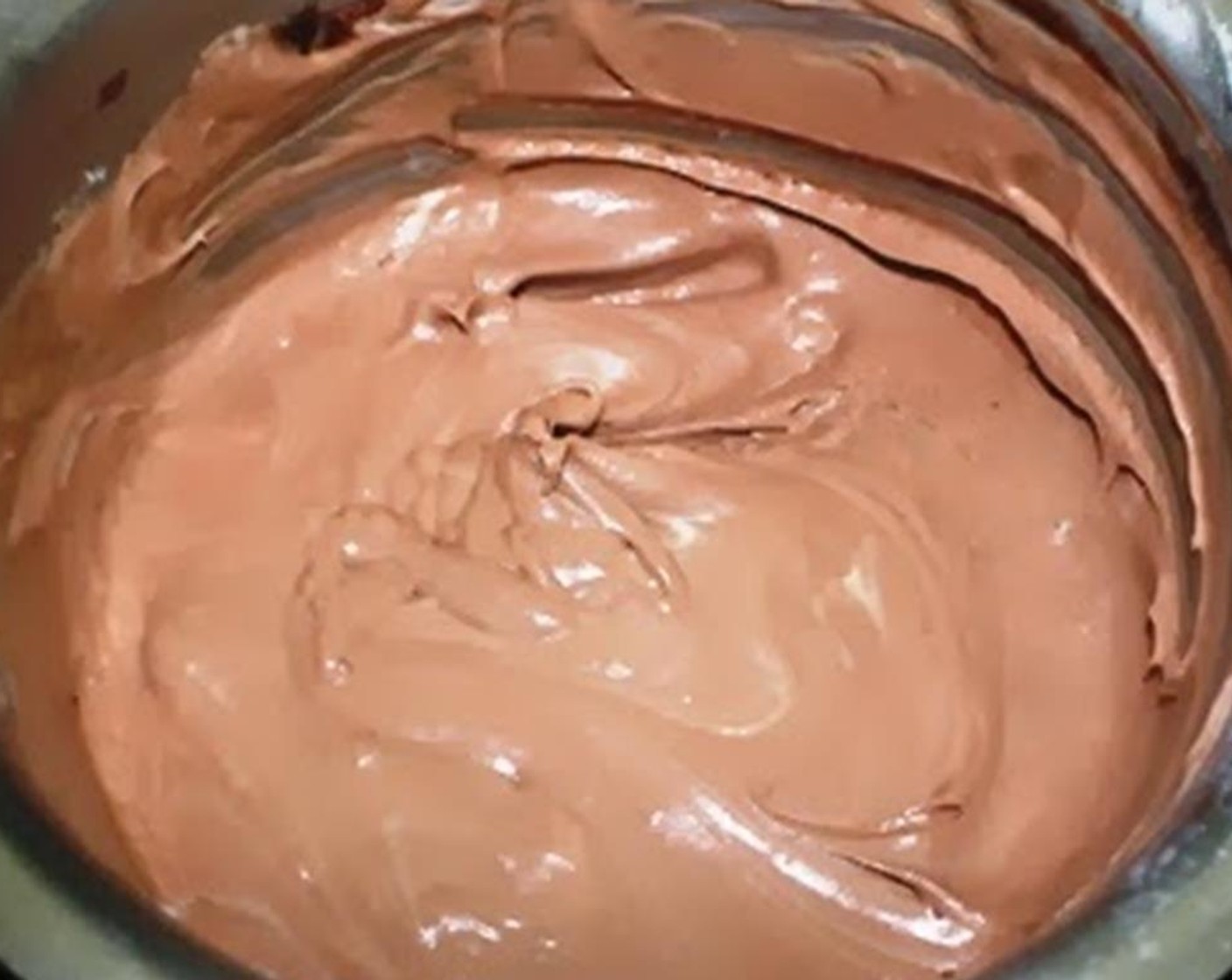 step 14 Add chocolate mixture into the whipped cream and gently fold until you have a smooth, cohesive mixture. Let it chill completely until thick and mousse like.