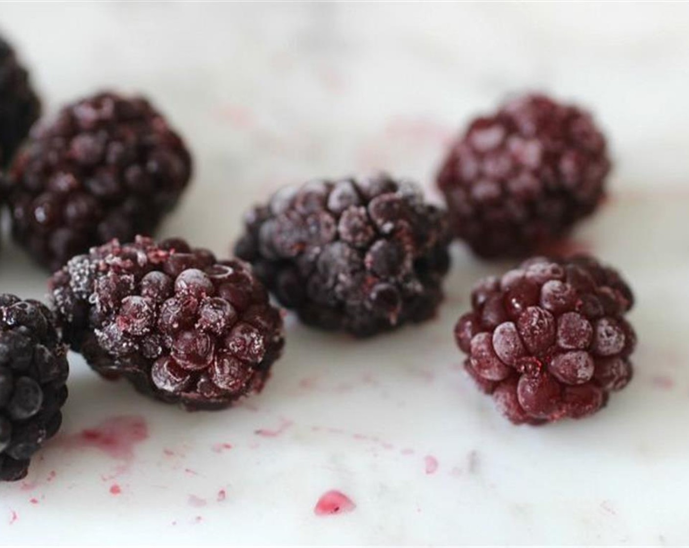 step 4 Mix until well combined. Add the melted butter and mix carefully until fully incorporated. This mixture will be silky and shiny. Meanwhile, cut the Fresh Blackberry (2/3 cup) in thirds.