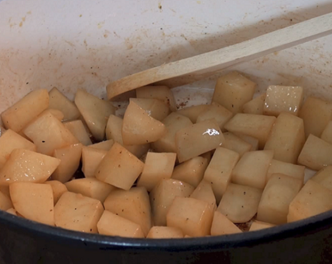 step 3 To the pot, add a bit more olive oil and the Potatoes (3). Cook for a few minutes, stirring frequently until the potatoes are nicely browned. Remove pan from heat.