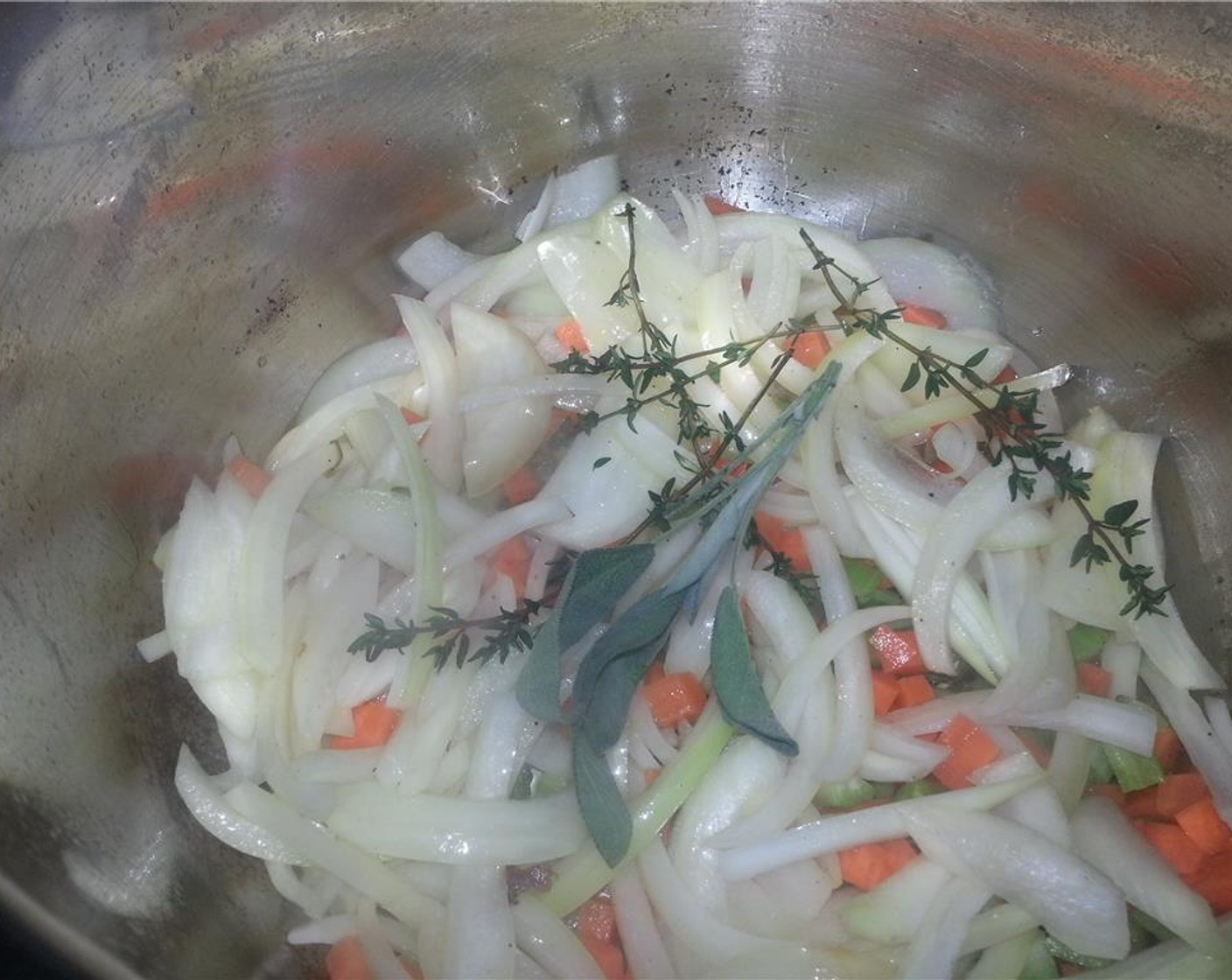 step 4 Remove the seared pork and set aside. Add in the onions, carrots, celery and pepper, Fresh Thyme (1 sprig) and Fresh Sage (1 sprig), and saute for 5 minutes over medium high heat. Season with a bit of Salt (to taste) and Serrano peppers.