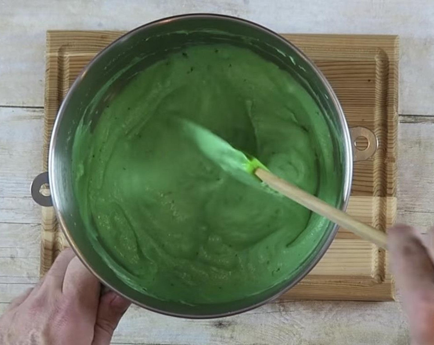 step 10 Add green marshmallow mint mixture into whisked cream. Fold until combined.