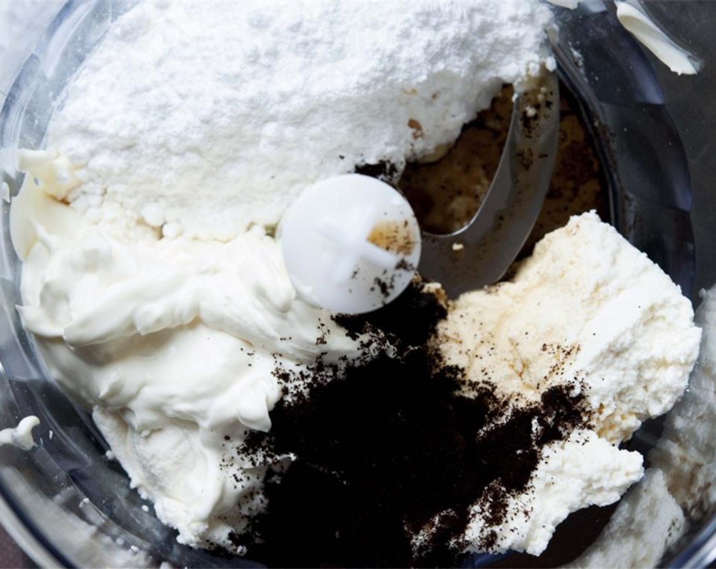step 3 In a blender, combine the Heavy Cream (3/4 cup), Ricotta Cheese (1 cup), Ground Coffee (1 Tbsp), Powdered Confectioners Sugar (1 cup), and the Vanilla Bean Paste (1/2 tsp).