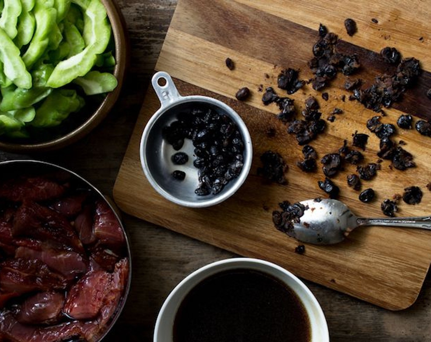 step 5 On a cutting board, smush the beans up with the back of a spoon or finely chop it with a knife and add it back to the bowl.