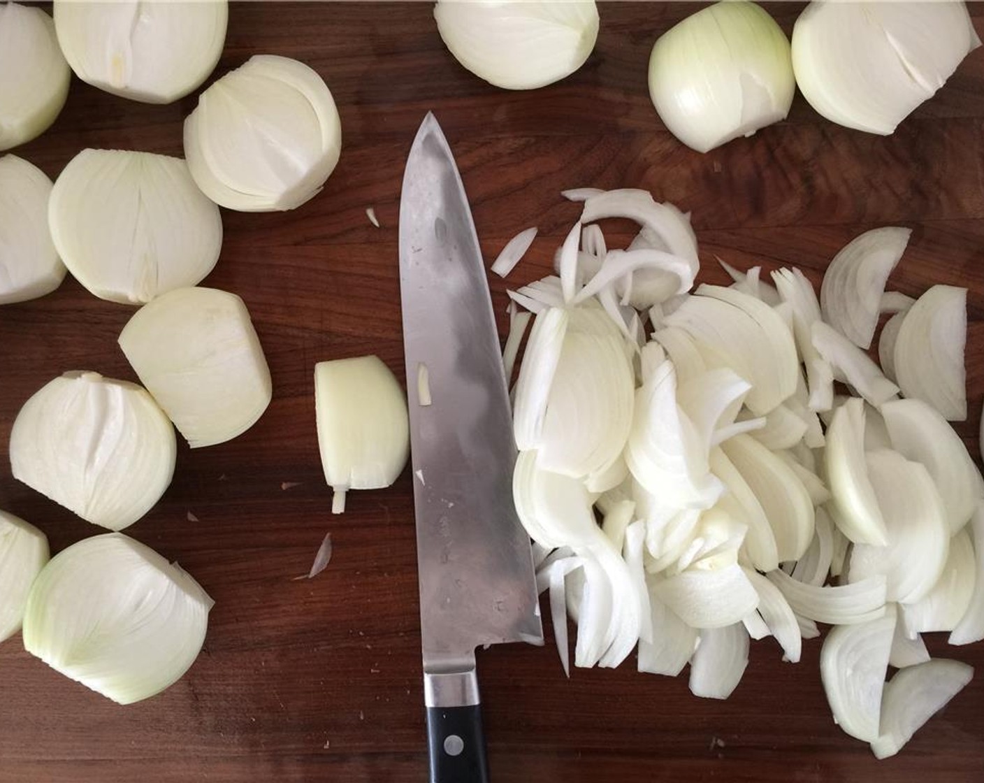 step 3 Julienne the onions and add them to a large mixing bowl.