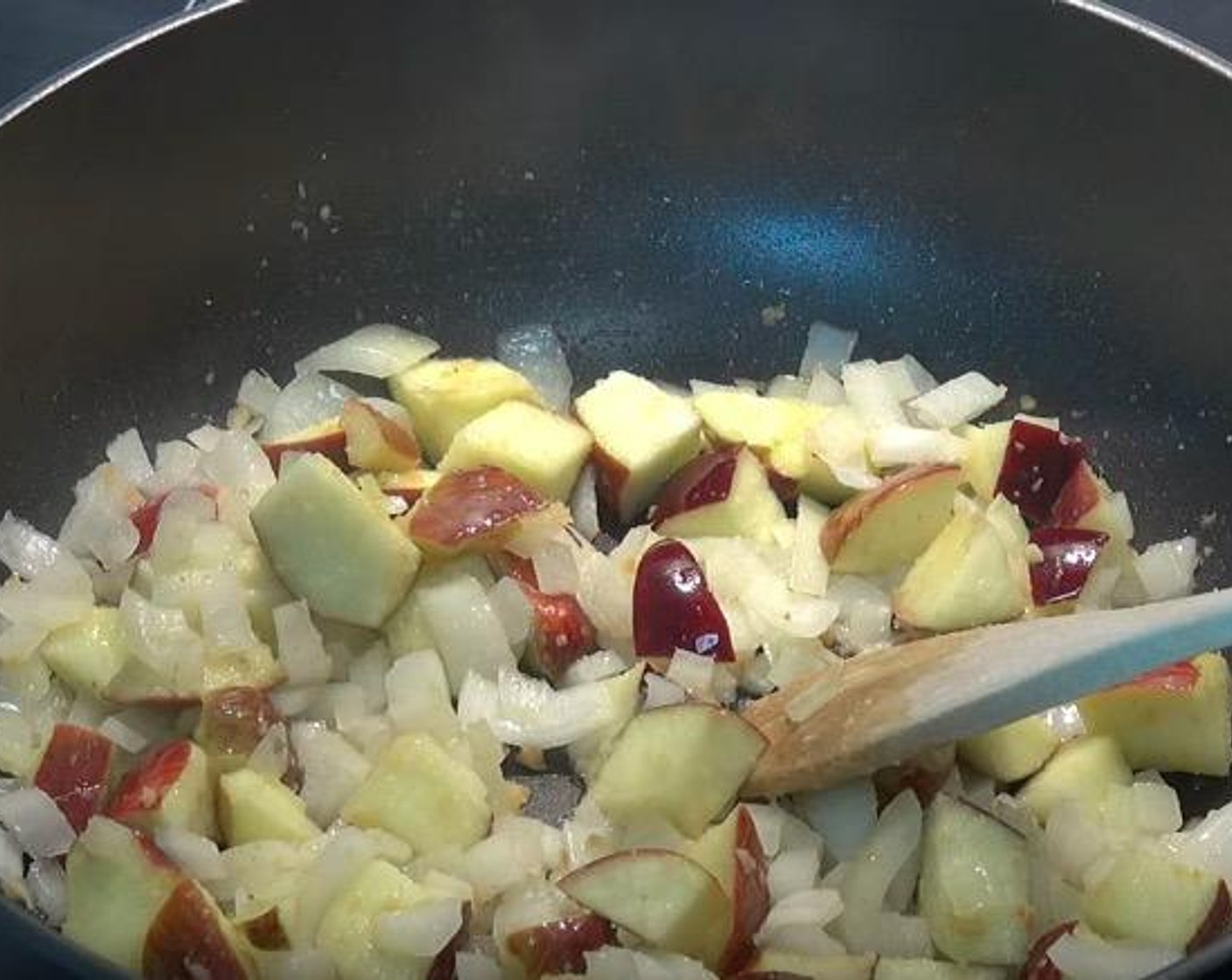 step 1 In a frying pan over medium heat, add Vegetable Oil (as needed), Yellow Onion (1), Red Apple (1), and Fresh Ginger (1/2 Tbsp). Cook for 7-8 minutes, or until the onions and apples have softened.