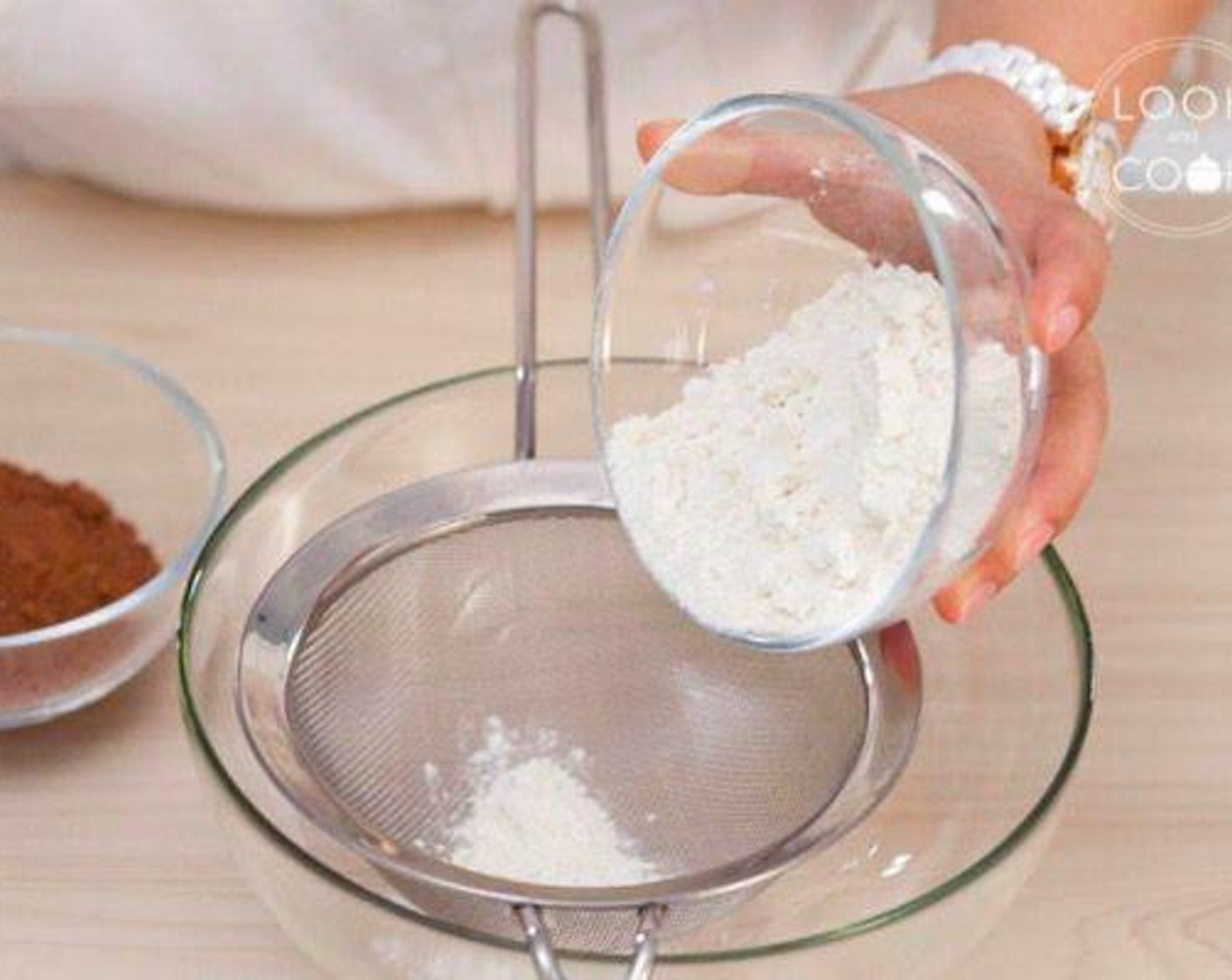 step 2 In a mixing bowl, sift All-Purpose Flour (1/3 cup), Baking Powder (1/4 tsp)