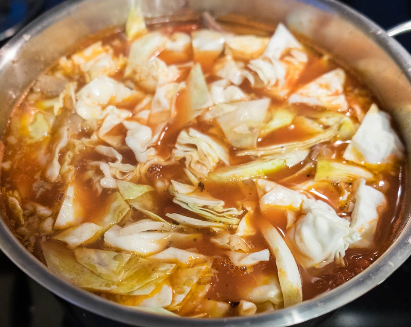 step 8 Simmer for another 30 to 40 minutes, until the potato and cabbage become tender. Adjust seasoning by adding more salt, if necessary.