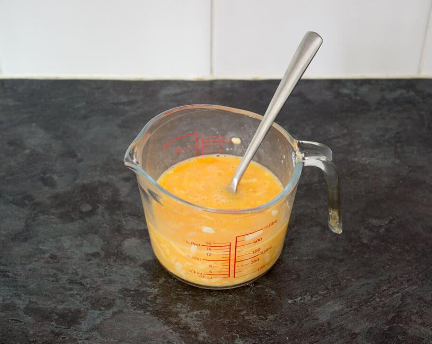 step 1 In a jug or bowl, beat together the Eggs (4), Mature Cheddar Cheese (1/2 cup), Milk (1 splash), and a generous pinch of Salt (to taste) with a fork until blended.